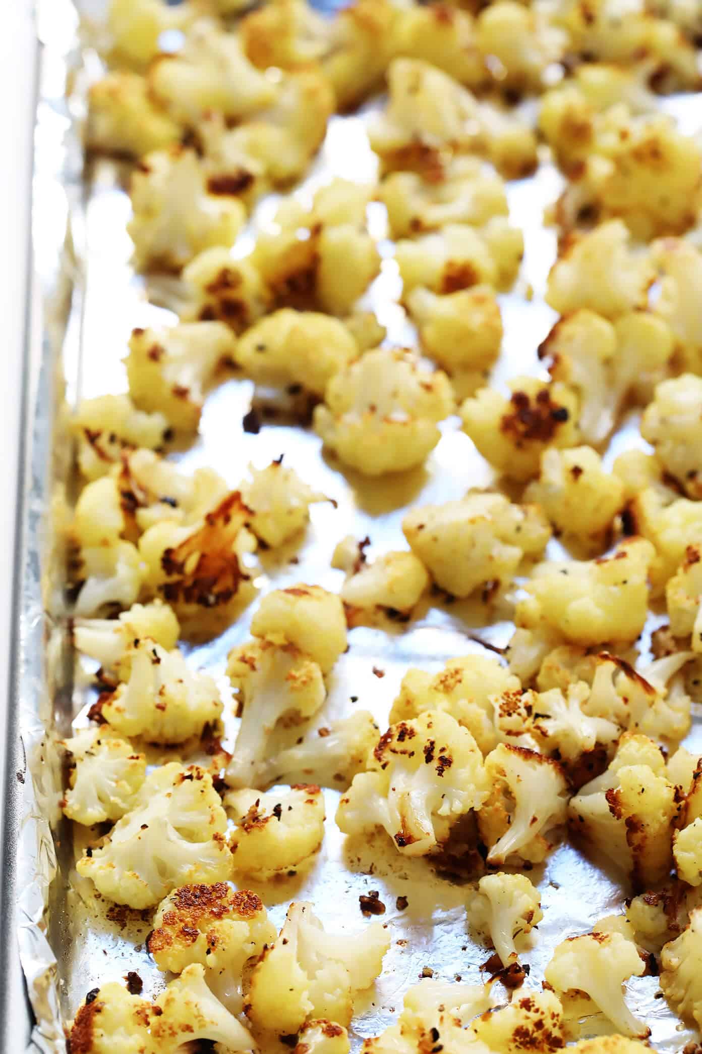 Love this vegetarian Buffalo Cauliflower Dip! It's easy to make in the oven or slow cooker, it's full of big flavors, and it's the perfect appetizer for game day! | Gimme Some Oven #buffalocauliflower #diprecipes #appetizer #vegetarianrecipes Roasted Cauliflower