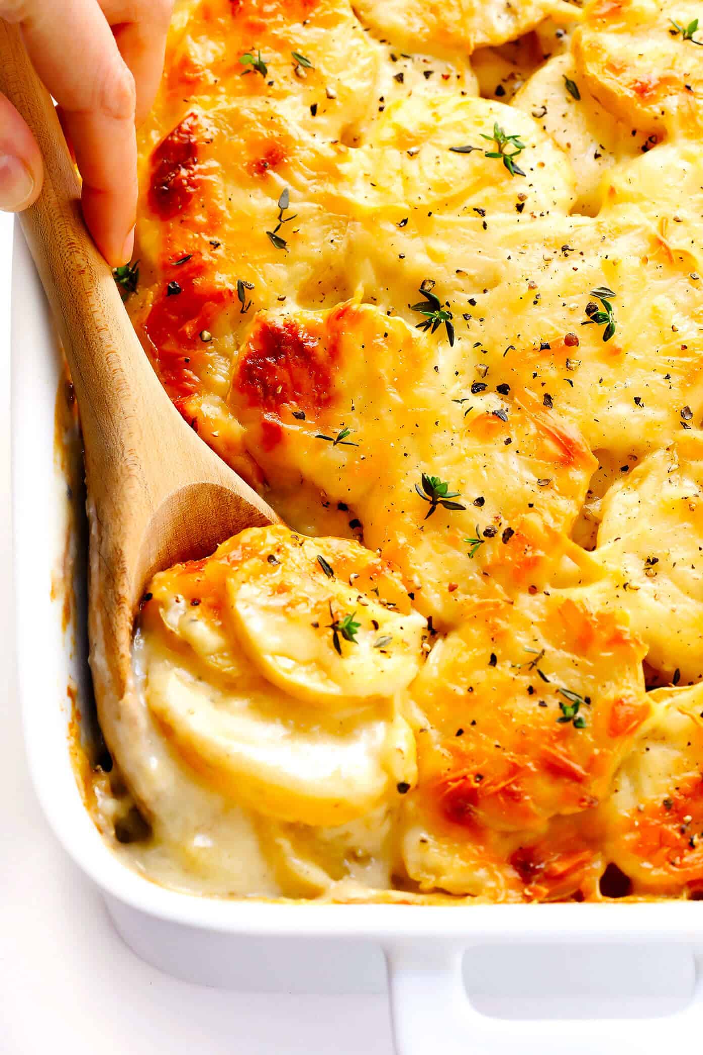My all-time favorite garlic scalloped potatoes recipe! They're perfectly garlicky and creamy, easy to make, and always a crowd fave. | Gimme Some Oven #scalloped #potatoes #thanksgiving #side #christmas #easter #holiday #vegetarian Scalloped Potatoes Recipe