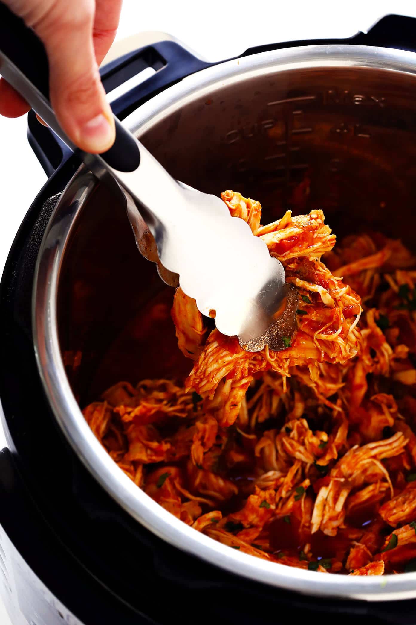 This 3-Ingredient Mexican Shredded Chicken recipe is full of great flavor, easy to make in the Instant Pot or Crock-Pot, and perfect for tacos, burritos, quesadillas, salads and more! | Gimme Some Oven #mexican #chicken #instantpot #crockpot #shredded #dinner #tacos Pressure Cooker Shredded Mexican Chicken