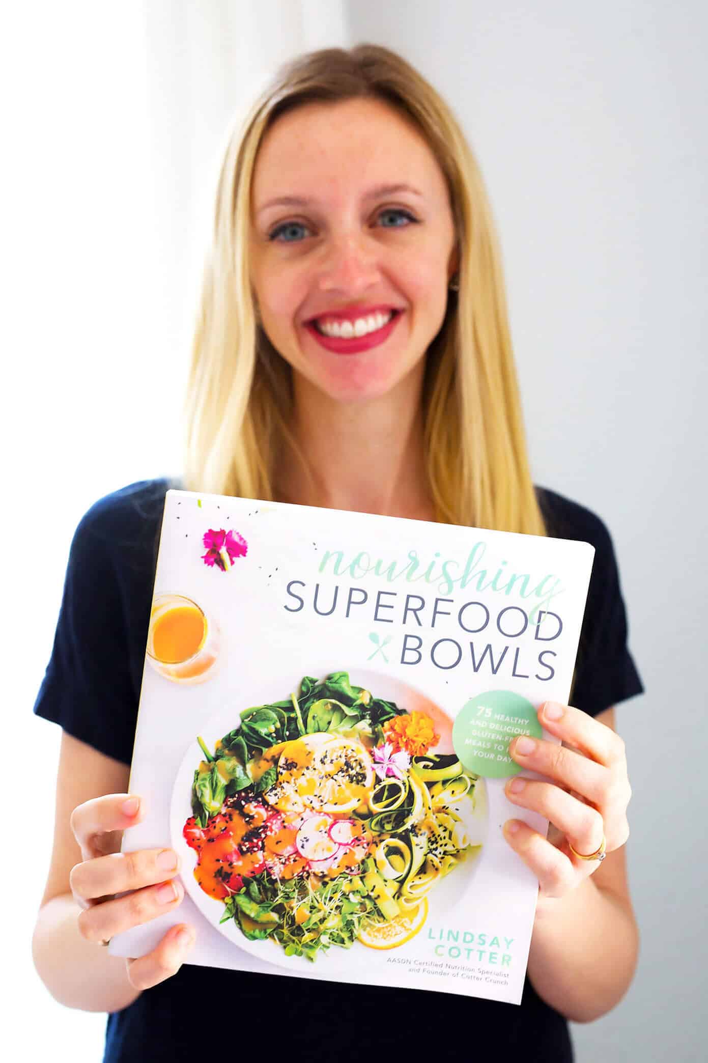 Love these Curried Satay Veggie Bowls! They only take about 20 minutes to make, they're made with lots of zoodles (or you can sub in other veggies or rice noodles), and feature the most heavenly red curry sauce (featuring chickpeas, coconut milk and peanut butter, YUM). Perfect for an easy dinner or meal prep! | Gimme Some Oven #glutenfree #vegan #curry #dinner #healthy #vegetarian Nourishing Superfood Bowls by Lindsay Cotter