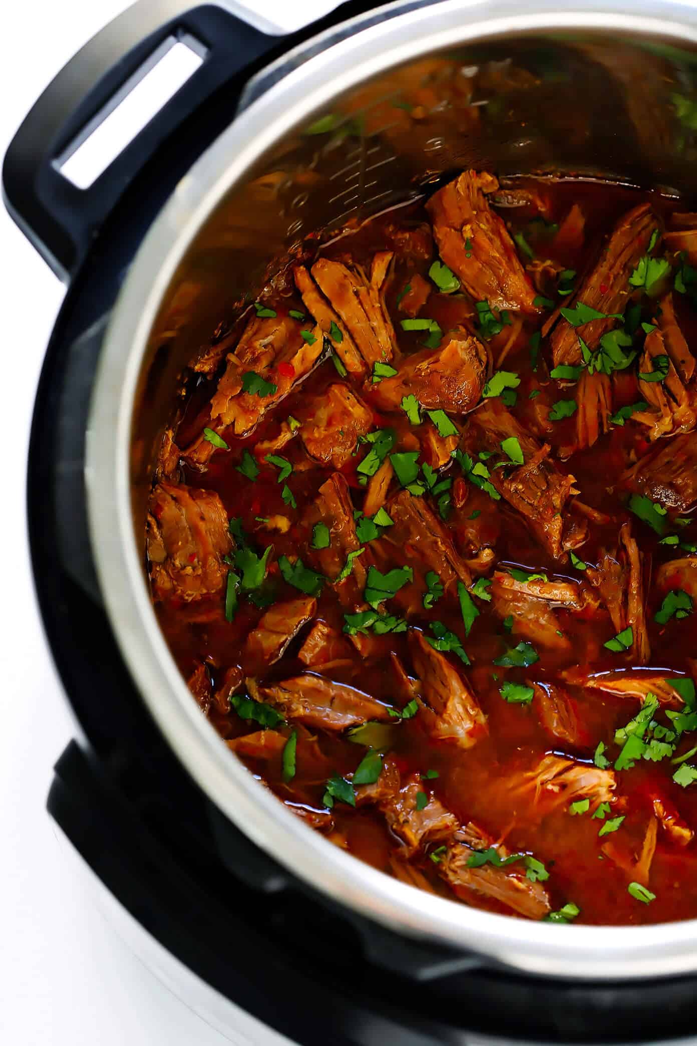 Love this Instant Pot Barbacoa Beef recipe! It's easy to make in the pressure cooker, full of big flavors, and perfect for tacos, burritos, salads, soups, quesadillas and more. | Gimme Some Oven #mexican #instantpot #barbacoa #cincodemayo #tacos #chipotle #recipe Instant Pot Barbacoa Beef
