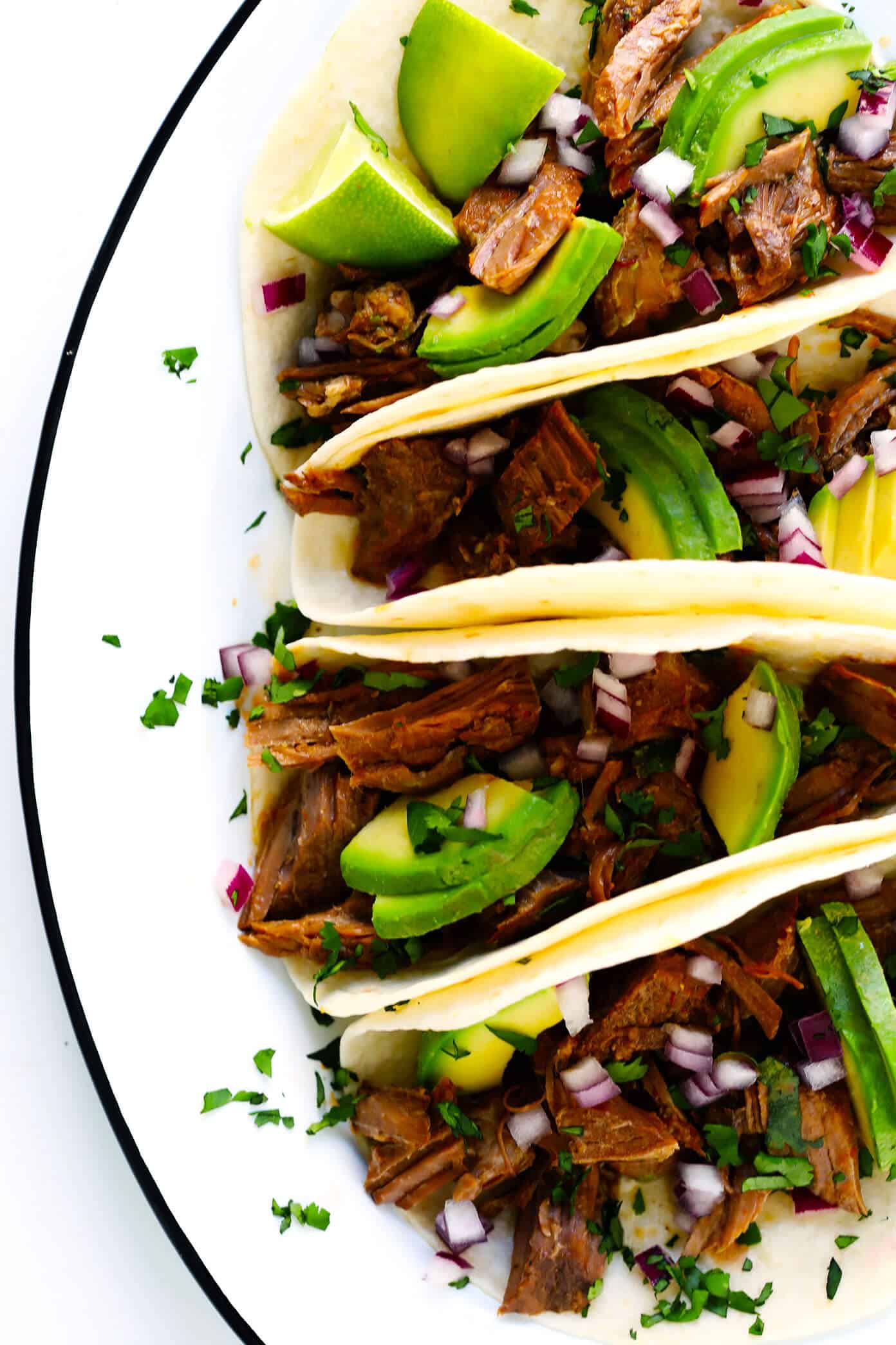 Love this Instant Pot Barbacoa Beef recipe! It's easy to make in the pressure cooker, full of big flavors, and perfect for tacos, burritos, salads, soups, quesadillas and more. | Gimme Some Oven #mexican #instantpot #barbacoa #cincodemayo #tacos #chipotle #recipe Instant Pot Barbacoa Beef Tacos with Avocado