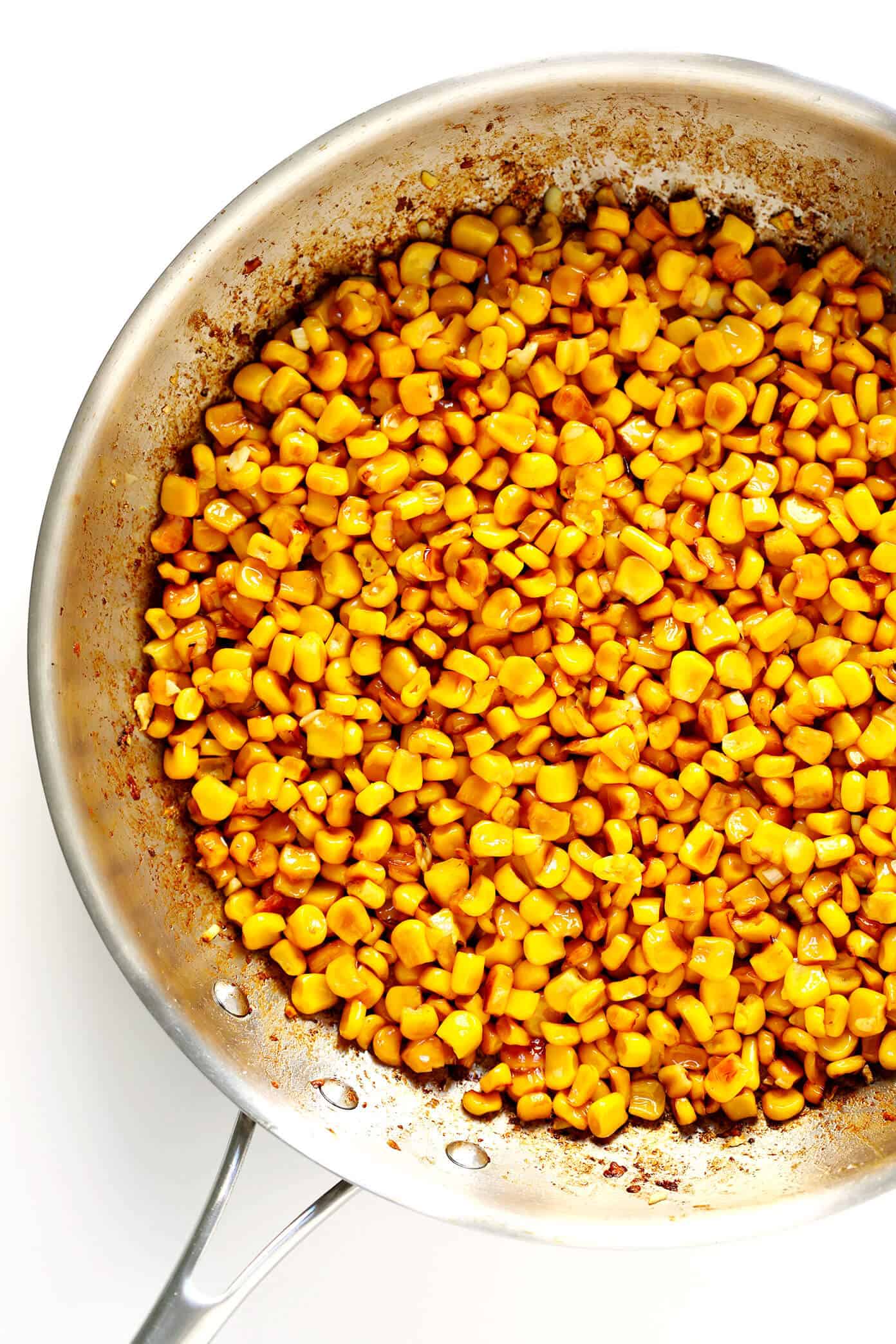 LOVE this Elote Dip recipe! It's quick and easy to make in about 15 minutes, naturally gluten-free, and full of all of those classic Mexican street corn ingredients we all love! And it can double as a salsa or topping for your tacos. | Gimme Some Oven #elote #mexican #corn #dip #salsa #appetizer Pan-Roasted Corn for Elote Dip