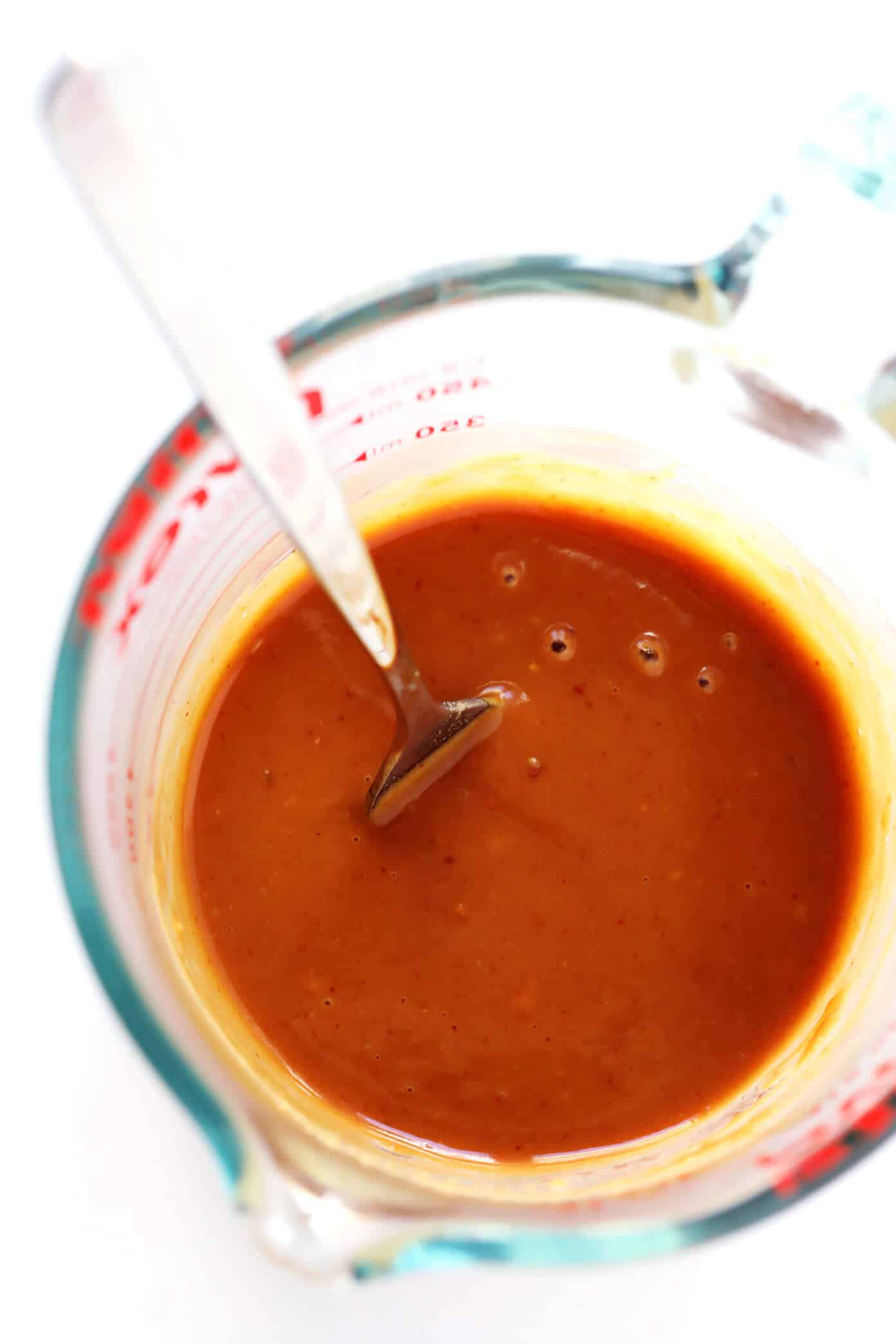 LOVE this peanut sauce recipe! It's perfect for dipping, drizzling, or if you thin it out with some water, it can turn into a delicious salad dressing too. | Gimme Some Oven #peanut #sauce #dressing #dip The BEST Peanut Sauce recipe, served with Mango Avocado Spring Rolls