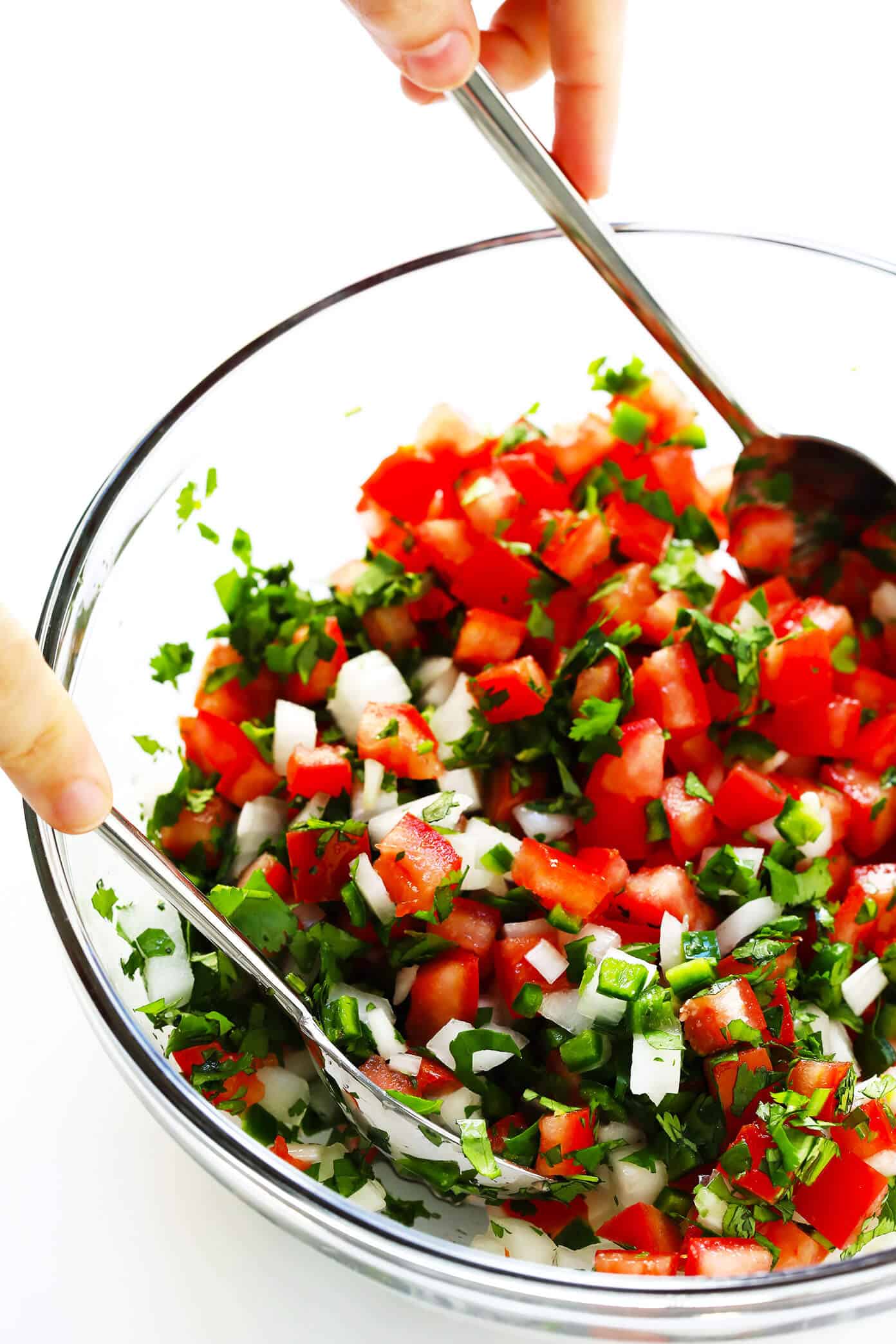 The BEST Pico de Gallo recipe! It's easy to make in 10 minutes with just 7 ingredients, it's perfect for topping all of your favorite Mexican dishes, or eating simply as salsa with chips. It's also naturally gluten-free and vegan, and perfect for Cinco de Mayo. | Gimme Some Oven #picodegallo #mexican #salsa #glutenfree #appetizer #vegan How To Make Pico De Gallo