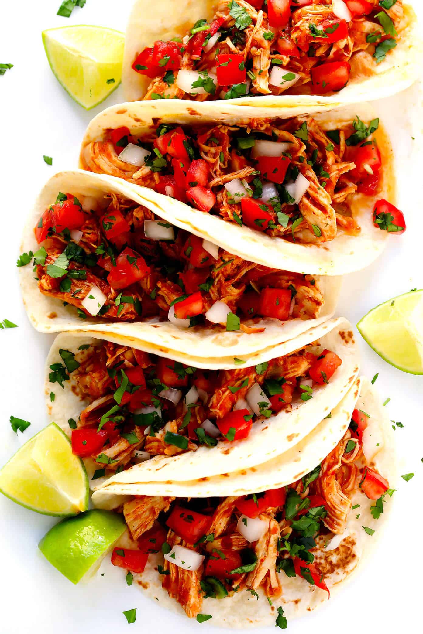 This 3-Ingredient Mexican Shredded Chicken recipe is full of great flavor, easy to make in the Instant Pot or Crock-Pot, and perfect for tacos, burritos, quesadillas, salads and more! | Gimme Some Oven #mexican #chicken #instantpot #crockpot #shredded #dinner #tacos Mexican Chicken Tacos with Pico de Gallo