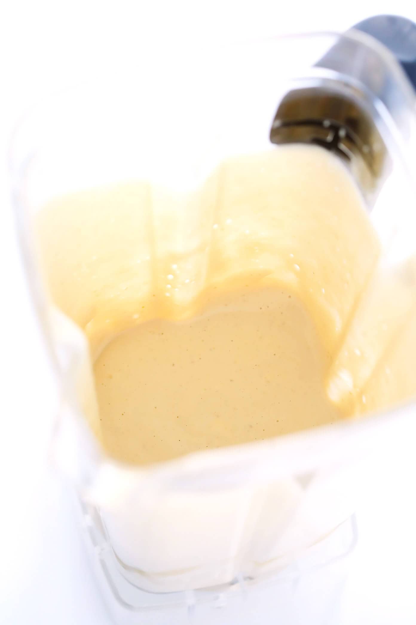 This 5-Minute Dreamy Tahini Dip recipe is quick and easy to make in the blender, it's naturally gluten-free and vegan, and it goes with just about everything. The perfect healthy appetizer or snack! | Gimme Some Oven #tahini #dip #appetizer #vegan #glutenfree Blender Tahini Dip
