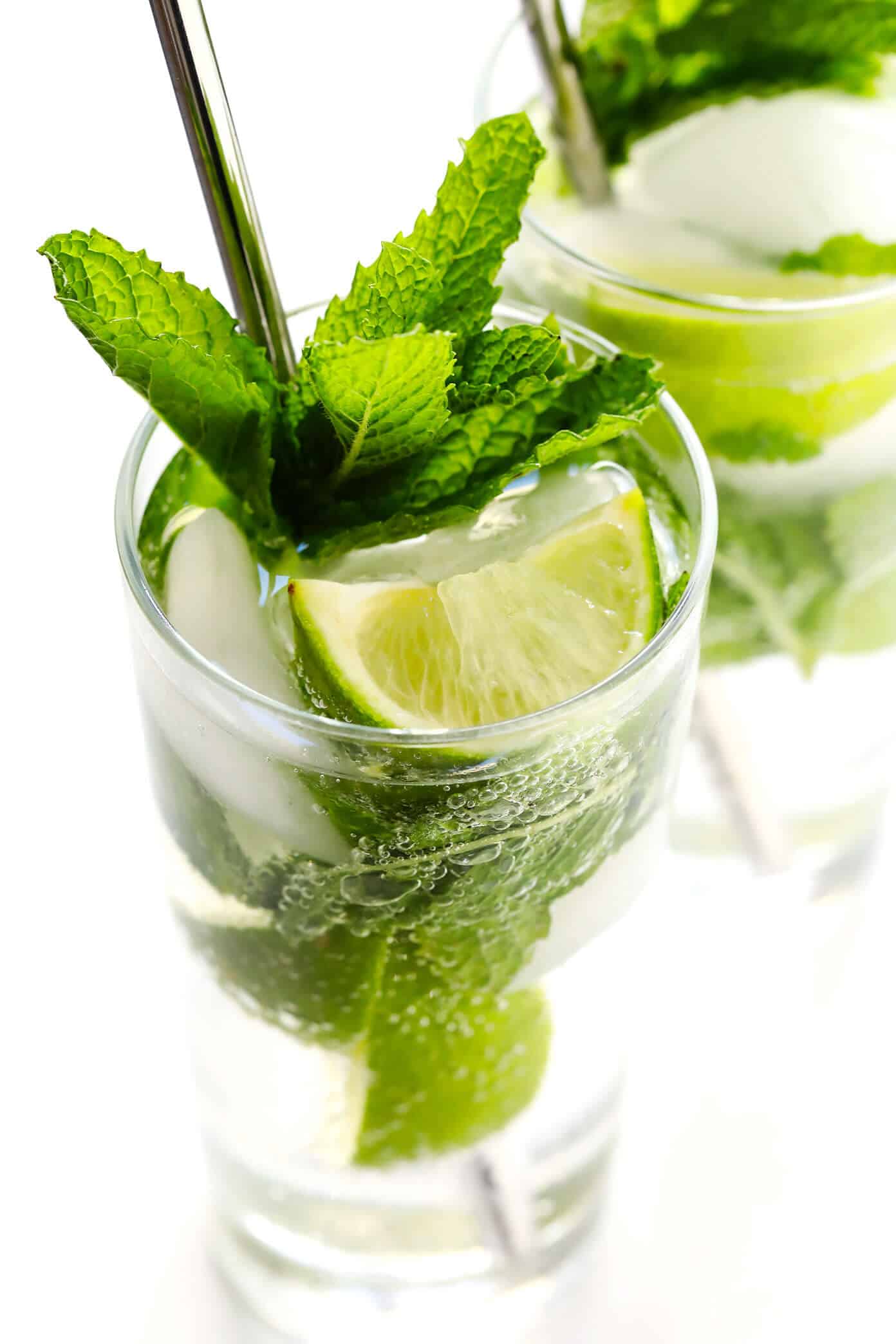 Truly the BEST mojito recipe! It's quick and easy to make with lots of fresh mint, lime juice and rum. It's naturally sweetened with honey. And easy to make in a single cocktail serving, or as a pitcher for a crowd. The perfect summer drink! | Gimme Some Oven #mojito #cocktail #drink #summer #recipe How To Make Mojitos