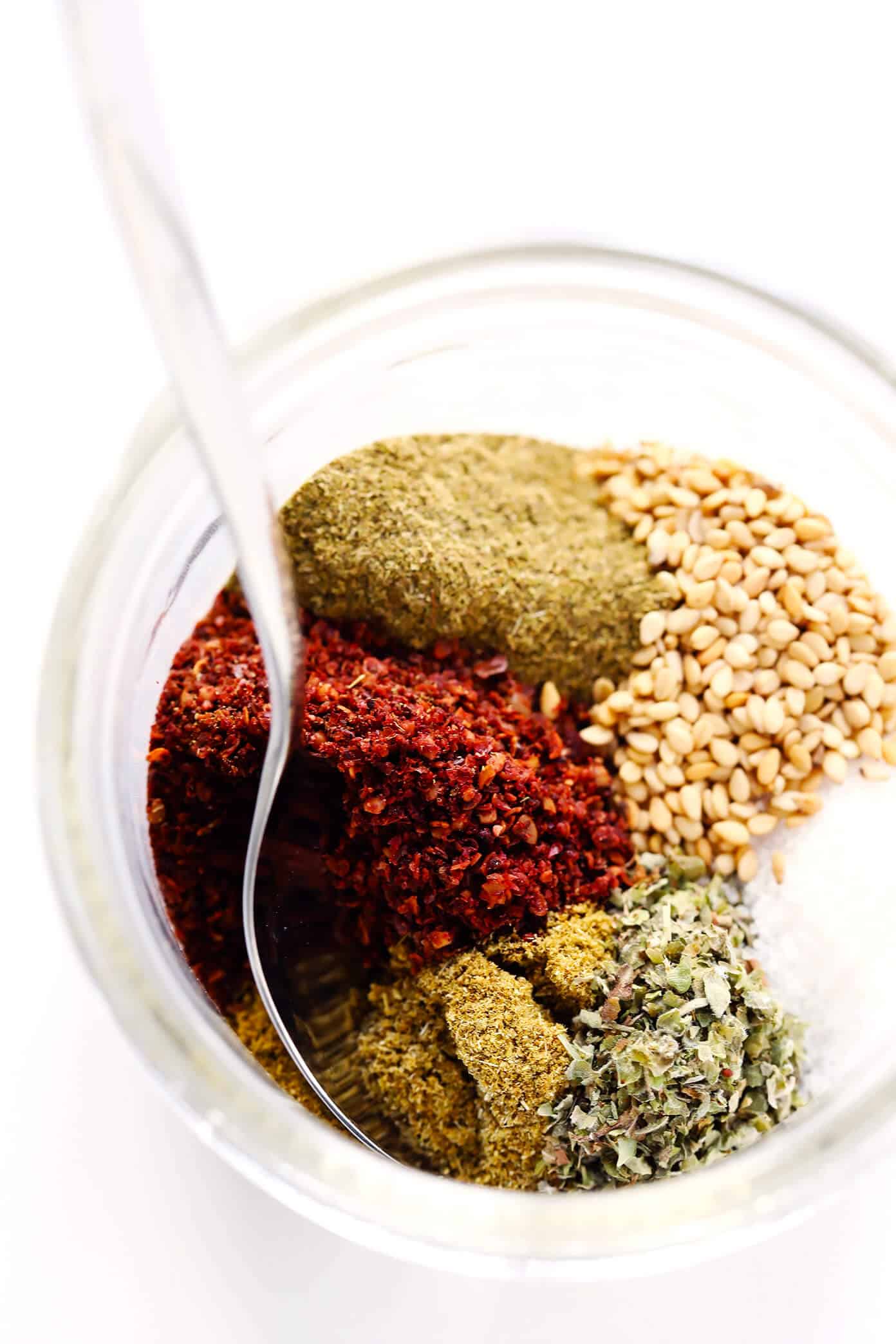 This 5-Minute Middle Eastern Za'atar seasoning recipe is perfect for everything from veggies, to chicken, steak, seafood, breads, hummus, olives, chickpeas, salads, vinaigrettes, popcorn and more! | Gimme Some Oven #zaatar #seasoning #blend #recipe #spice How To Make Za'atar Seasoning
