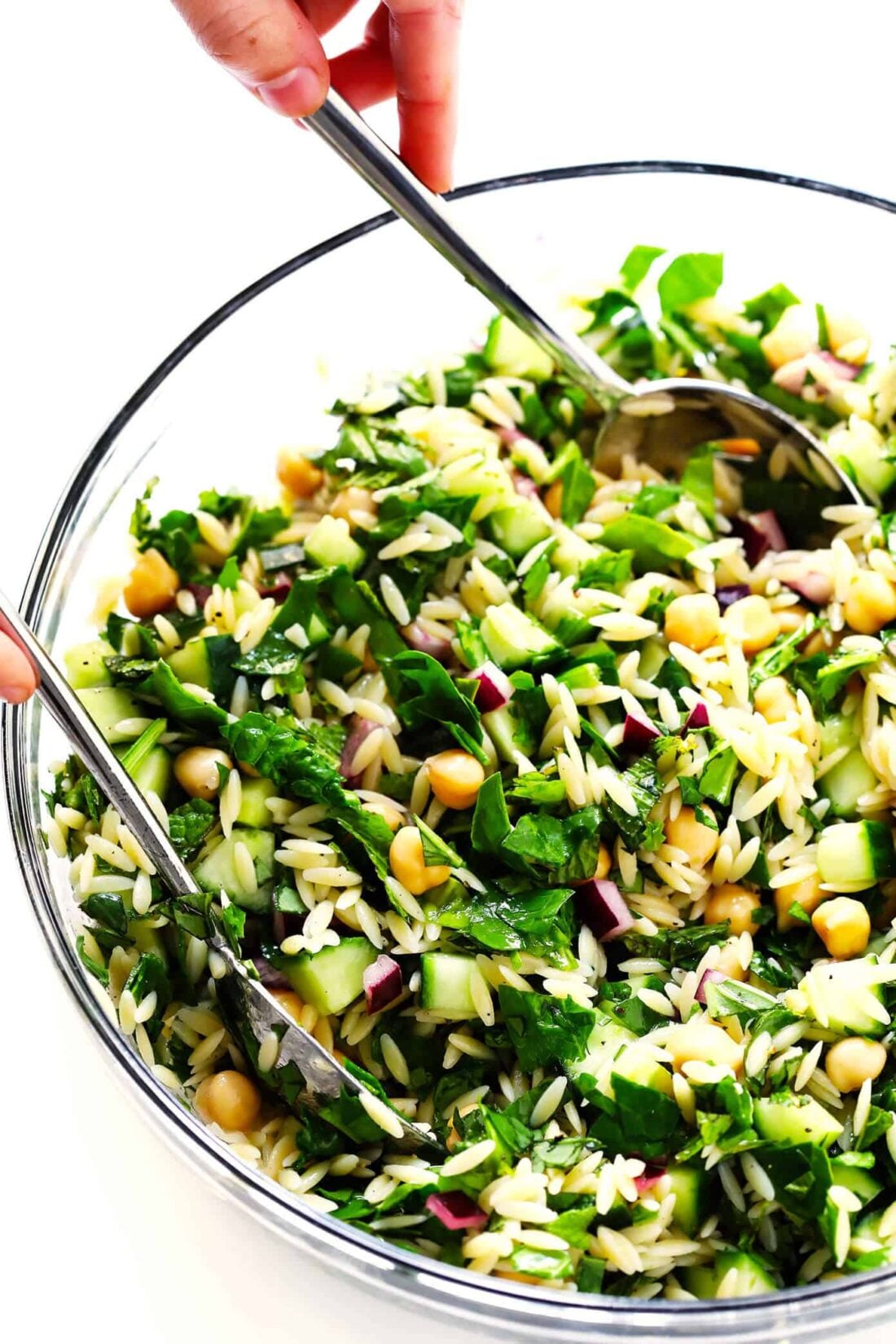 This Lemony Orzo Pasta Salad is made with hearty orzo pasta, fresh spinach or arugula, chickpeas, cucumber, onions, feta cheese, and a lemon herb dressing. It's the perfect make ahead pasta salad for summer! | gimmesomeoven.com #pastasalad #vegetarian #dinner #mealprep #dressing #pasta Herb Lovers Lemony Orzo Pasta Salad