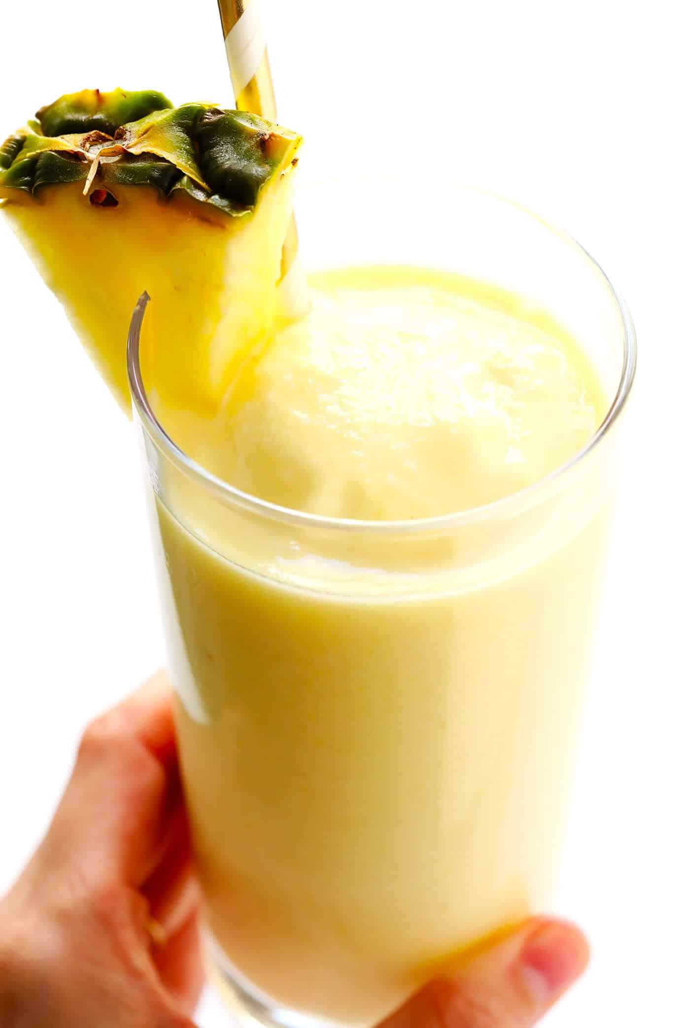 The BEST Piña Colada recipe -- made with three easy ingredients, no added sweeteners, and SO delicious. Pineapple and coconut make for the perfect frozen summer cocktail! | Gimme Some Oven #pinacolada #pineapple #cocktail #frozen #drink #summer #rum Best Piña Colada Recipe