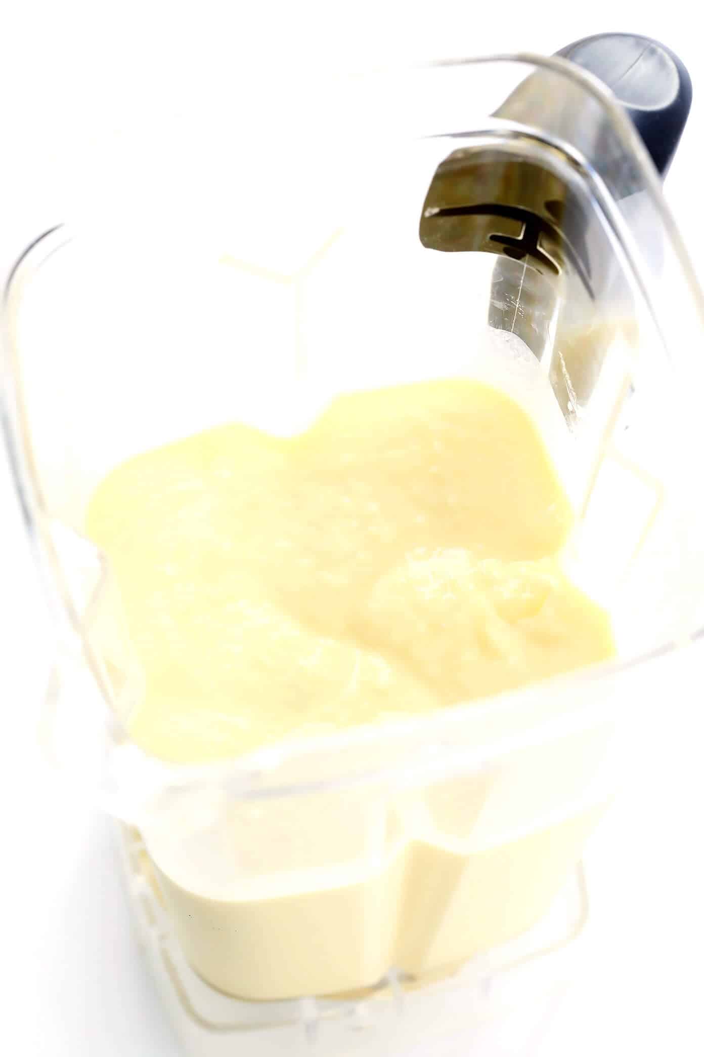 The BEST Piña Colada recipe -- made with three easy ingredients, no added sweeteners, and SO delicious. Pineapple and coconut make for the perfect frozen summer cocktail! | Gimme Some Oven #pinacolada #pineapple #cocktail #frozen #drink #summer #rum How To Make A Piña Colada Recipe