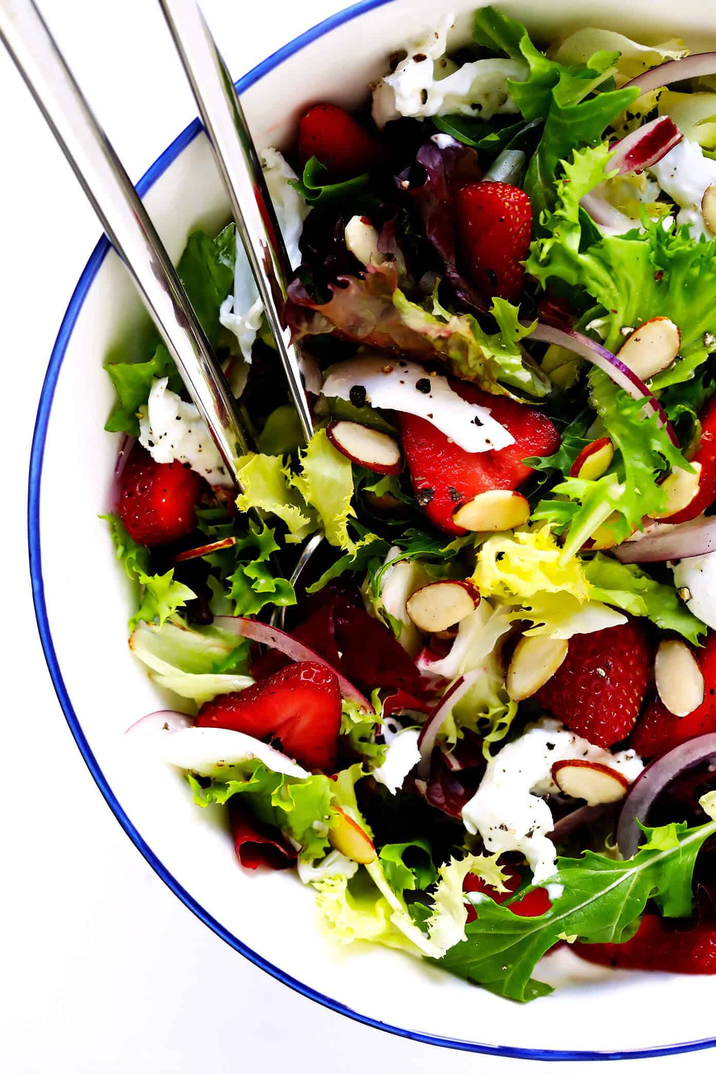 This Strawberry Burrata Salad is made with fresh berries, creamy burrata mozzarella, toasted almonds, and tossed with the most delicious Italian basil vinaigrette. It's the perfect summer salad! | Gimme Some Oven #strawberry #salad #summer #dinner #healthyrecipes How To Make Strawberry Burrata Salad with Basil Vinaigrette