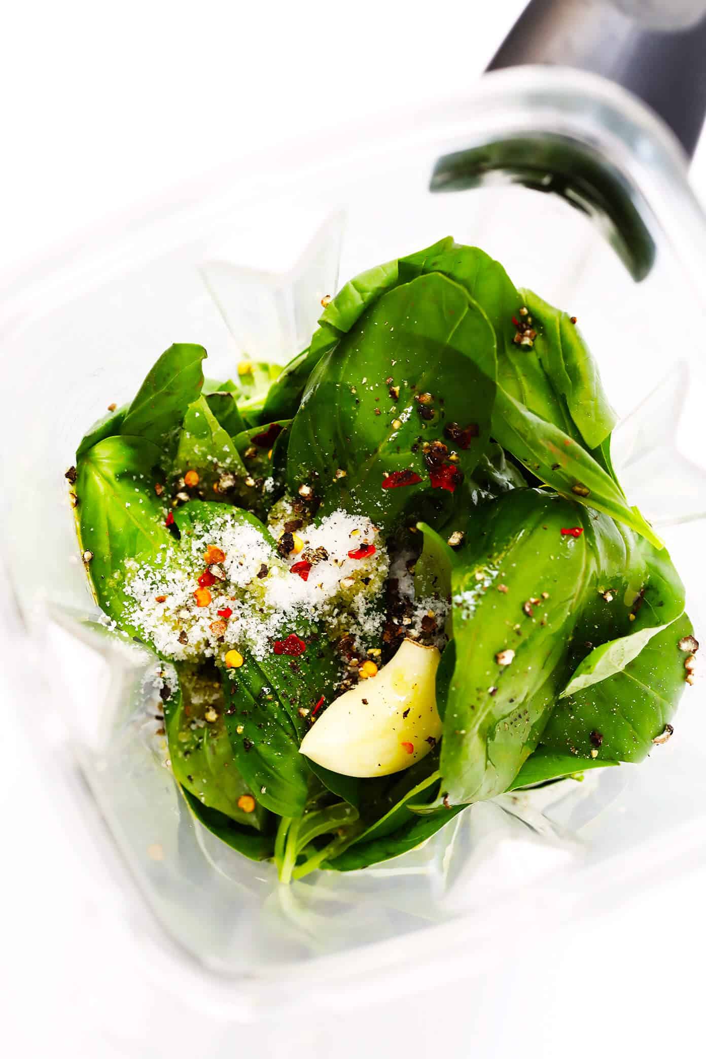 LOVE this Basil Vinaigrette recipe! It's quick and easy to make, and perfect drizzled on a salad, soup, pizza, roasted vegetables, grilled chicken...and so much more. | Gimme Some Oven #vinaigrette #saladdressing #basil #dinner #healthy Basil Vinaigrette Ingredients in Blender