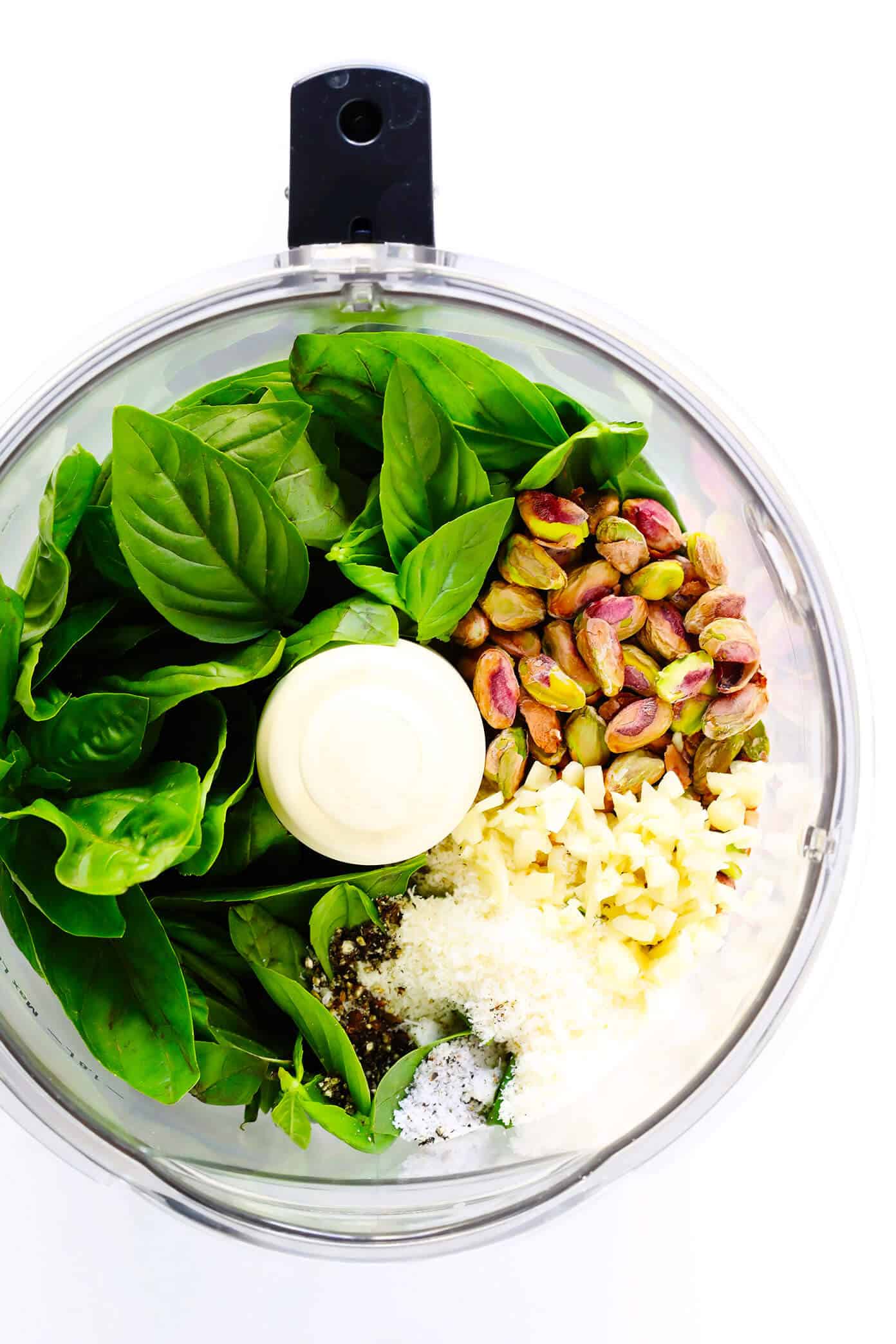 This delicious Pistachio Pesto recipe is easy to make in the blender or food processor, and so fresh and delicious! Use it as a sauce for pasta, pizza, veggies, chicken...you name it. | Gimme Some Oven #pesto #sauce #pistachio #vegetarian How To Make Pesto