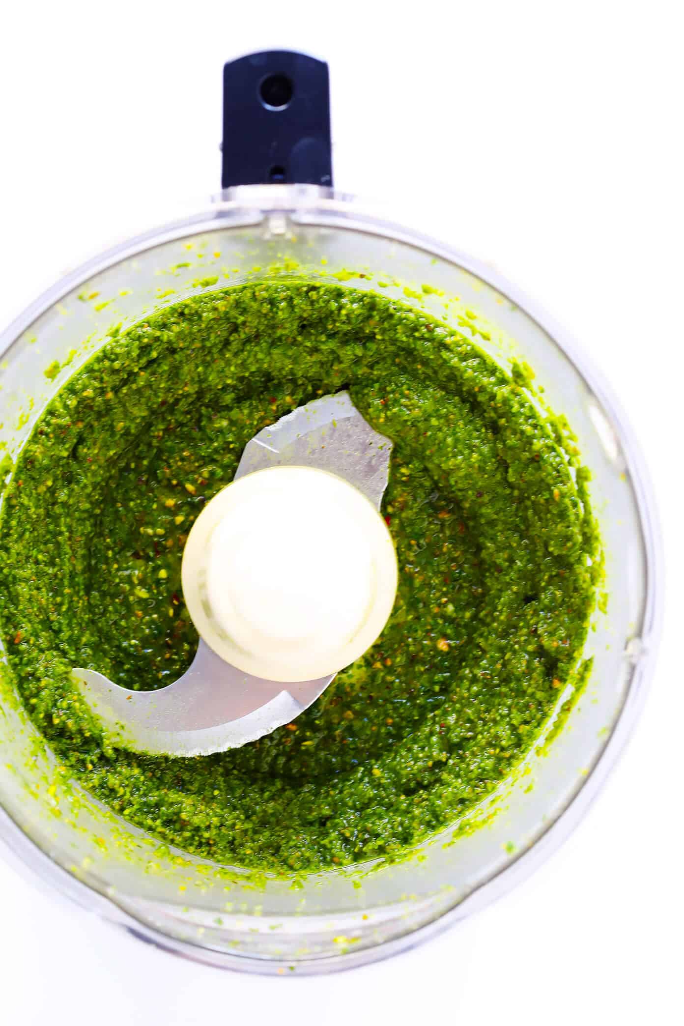 This delicious Pistachio Pesto recipe is easy to make in the blender or food processor, and so fresh and delicious! Use it as a sauce for pasta, pizza, veggies, chicken...you name it. | Gimme Some Oven #pesto #sauce #pistachio #vegetarian Pistachio Pesto Sauce