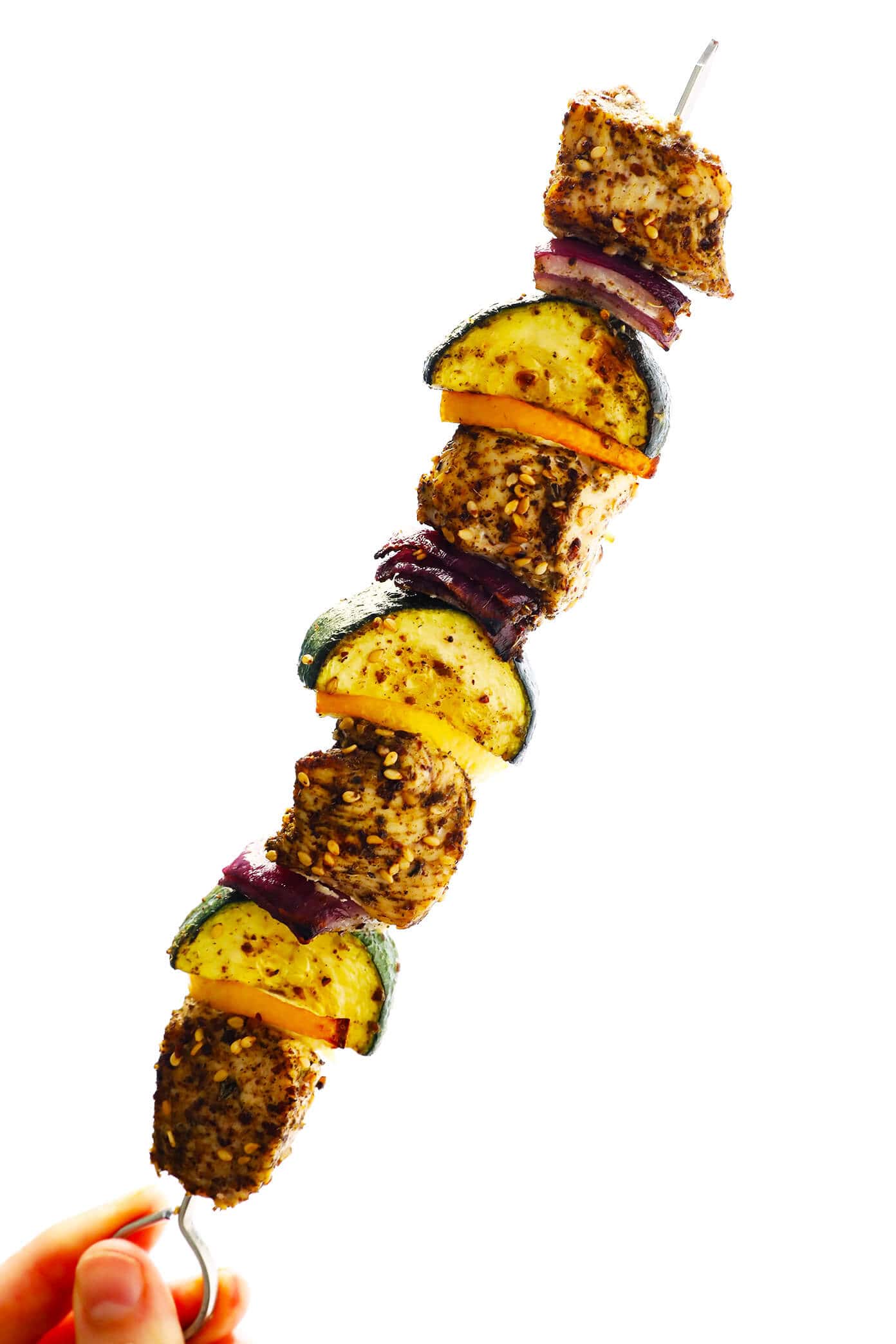 This easy Za'atar Chicken and Vegetable Kabobs recipe is easy to make with your favorite kind of veggies, and tossed with the most delicious lemon za'atar seasoning. Perfect for the grill or roasting in the oven, and naturally gluten-free. | Gimme Some Oven #zaatar #chicken #kabobs #skewers #vegetables Za'atar Chicken, Zucchini, Onion and Lemon Kabobs