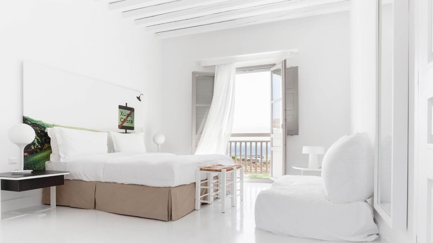 The Gimme Some Oven travel guide for restaurants to eat, hotels to stay and places to visit in Santorini, Greece. | Gimme Some Oven #santorini #greece #travel #traveltips #europe #vacation #islands #hotel #restaurant Beautiful Anemi Hotel Rooms in Folegandros, Greece