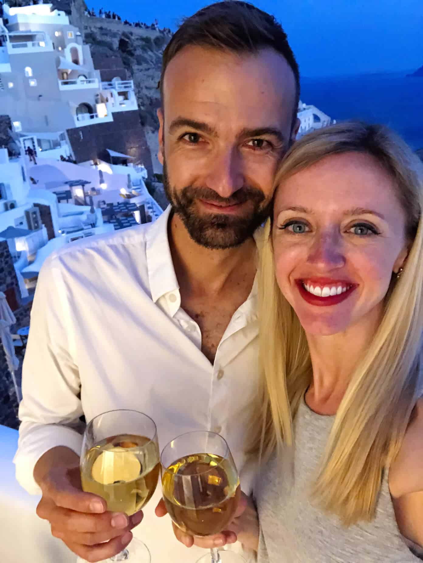The Gimme Some Oven travel guide for restaurants to eat, hotels to stay and places to visit in Santorini, Greece. | Gimme Some Oven #santorini #greece #travel #traveltips #europe #vacation #islands #hotel #restaurant Nighttime Wine in Oia Santorini Greece
