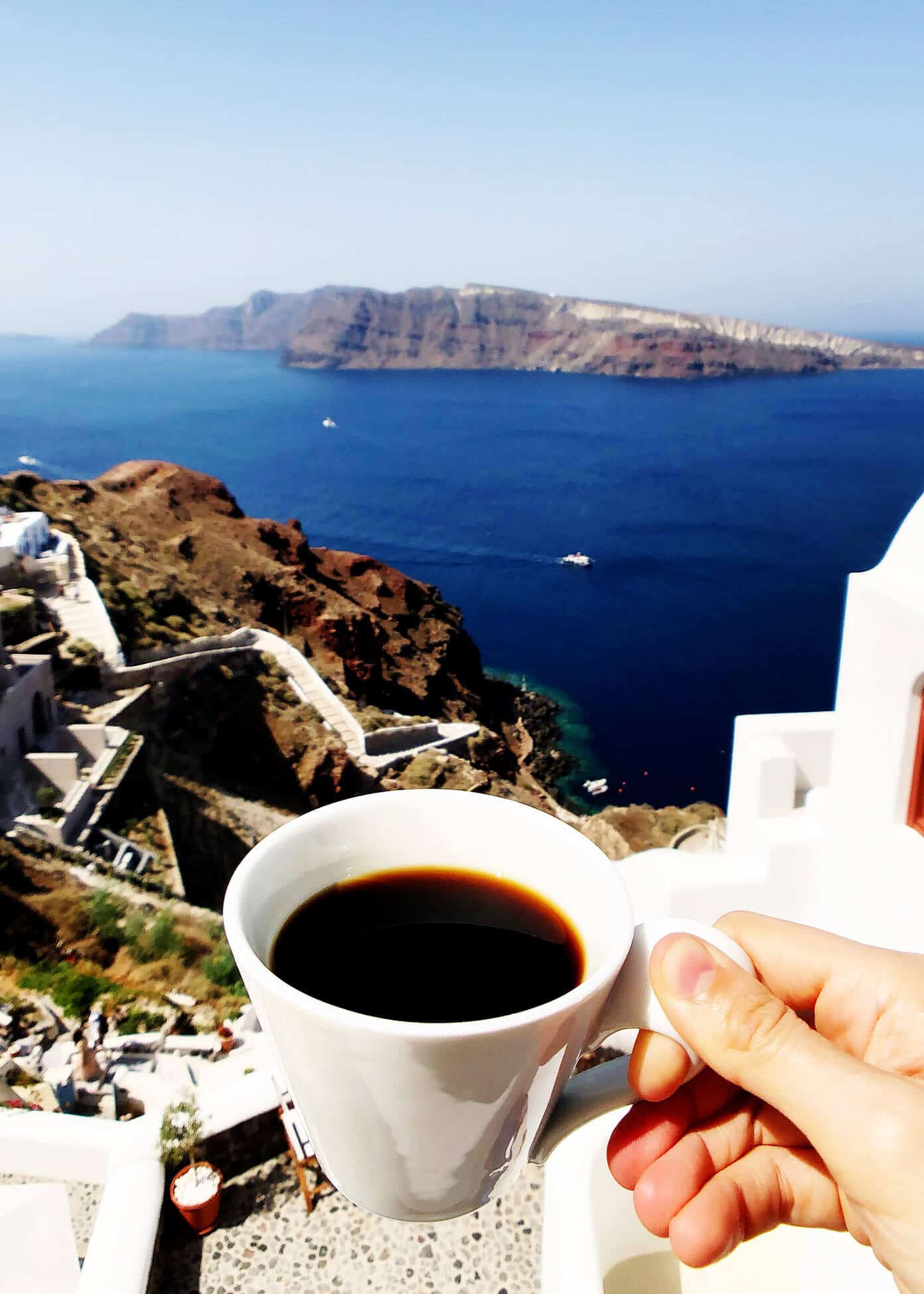 The Gimme Some Oven travel guide for restaurants to eat, hotels to stay and places to visit in Santorini, Greece. | Gimme Some Oven #santorini #greece #travel #traveltips #europe #vacation #islands #hotel #restaurant View at Oia Mare Villas in Santorini Greece