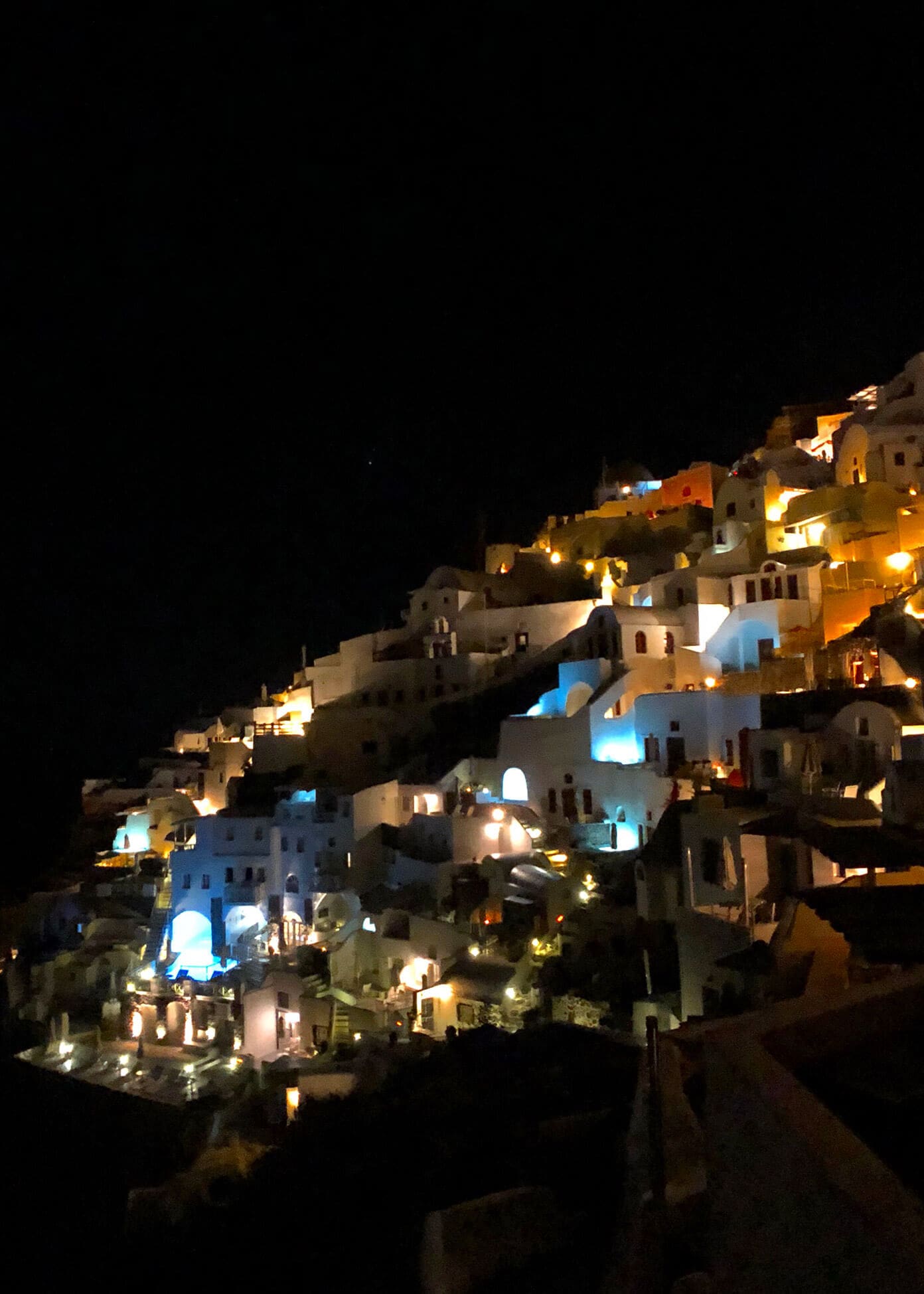 The Gimme Some Oven travel guide for restaurants to eat, hotels to stay and places to visit in Santorini, Greece. | Gimme Some Oven #santorini #greece #travel #traveltips #europe #vacation #islands #hotel #restaurant Night in Oia Santorini Greece