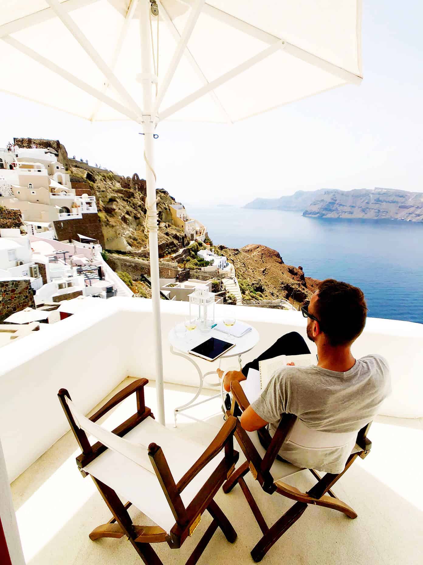 The Gimme Some Oven travel guide for restaurants to eat, hotels to stay and places to visit in Santorini, Greece. | Gimme Some Oven #santorini #greece #travel #traveltips #europe #vacation #islands #hotel #restaurant Hotel Balcony at Oia Mare Villas in Santorini Greece