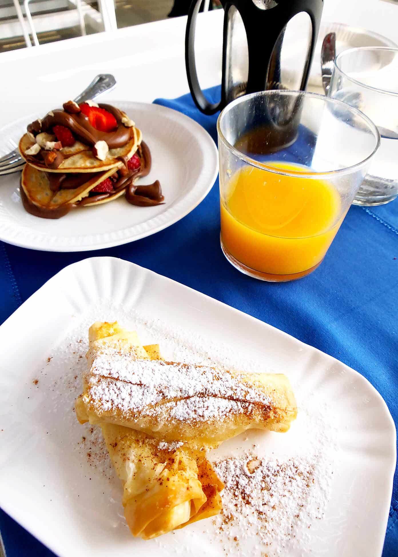 The Gimme Some Oven travel guide for restaurants to eat, hotels to stay and places to visit in Santorini, Greece. | Gimme Some Oven #santorini #greece #travel #traveltips #europe #vacation #islands #hotel #restaurant Breakfast at Anemi Hotel in Folegandros, Greece