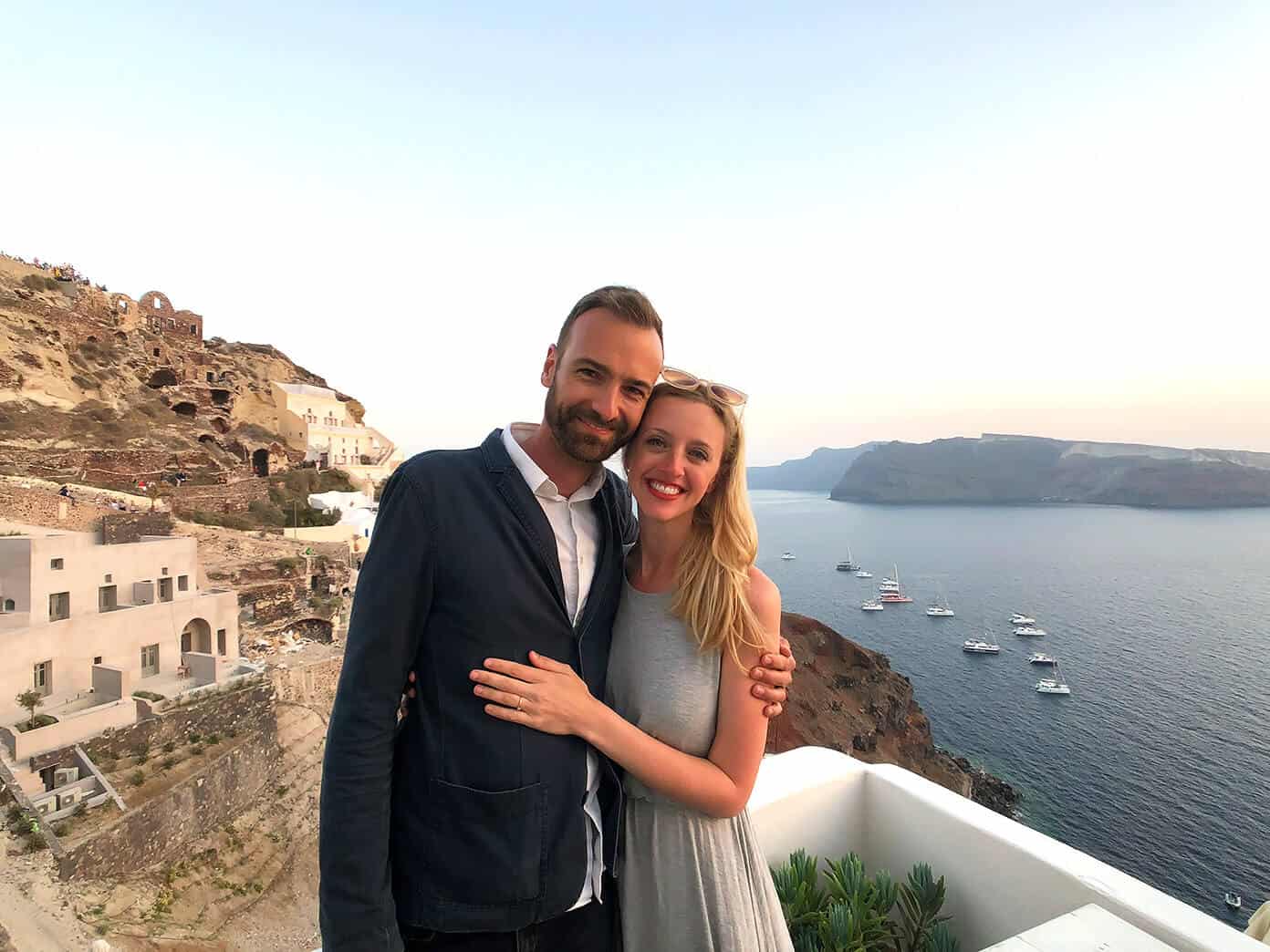 The Gimme Some Oven travel guide for restaurants to eat, hotels to stay and places to visit in Santorini, Greece. | Gimme Some Oven #santorini #greece #travel #traveltips #europe #vacation #islands #hotel #restaurant Greek Sunset at Oia Mare Villas in Santorini Greece
