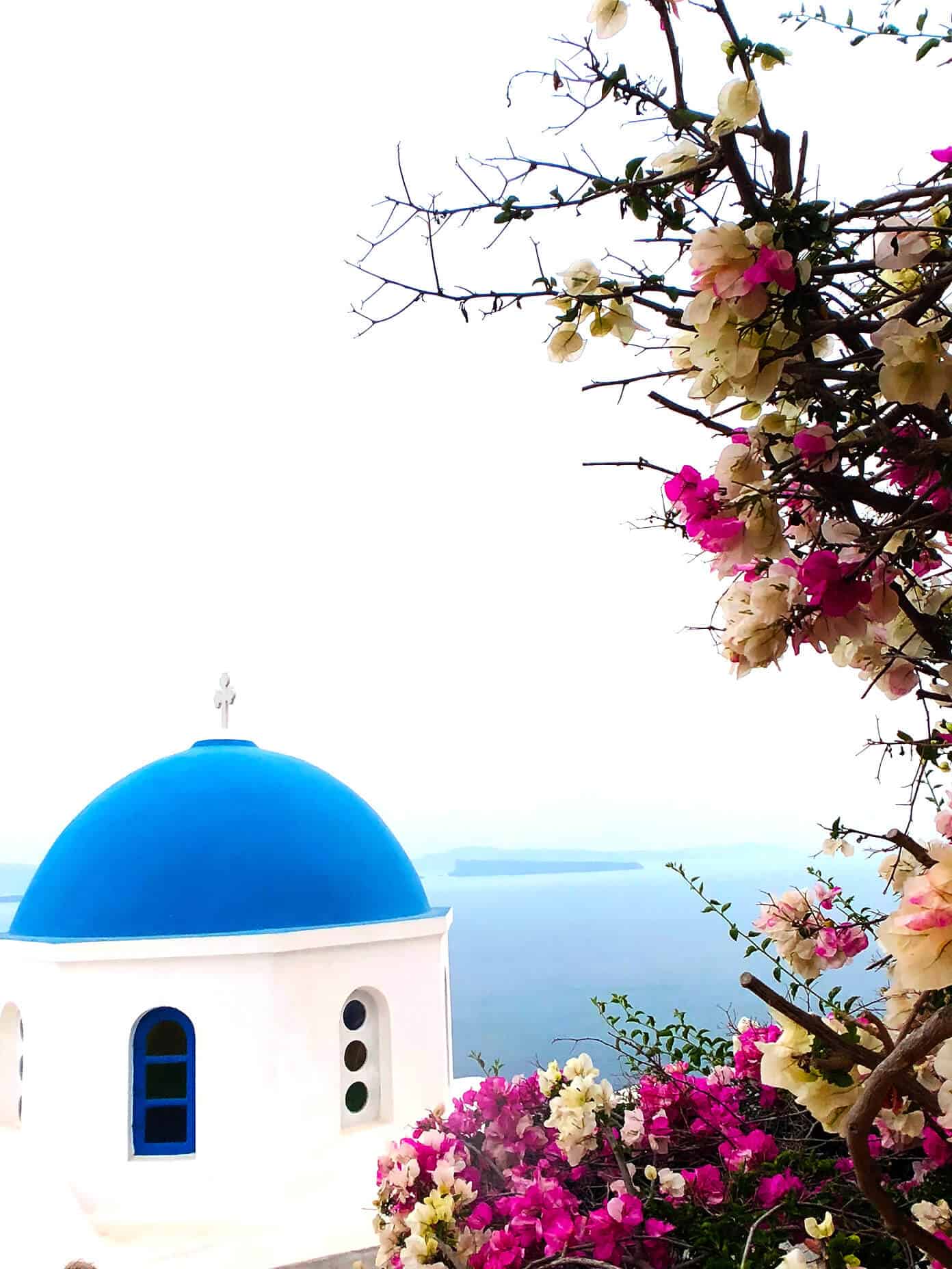The Gimme Some Oven travel guide for restaurants to eat, hotels to stay and places to visit in Santorini, Greece. | Gimme Some Oven #santorini #greece #travel #traveltips #europe #vacation #islands #hotel #restaurant Blue Domes in Santorini Greece