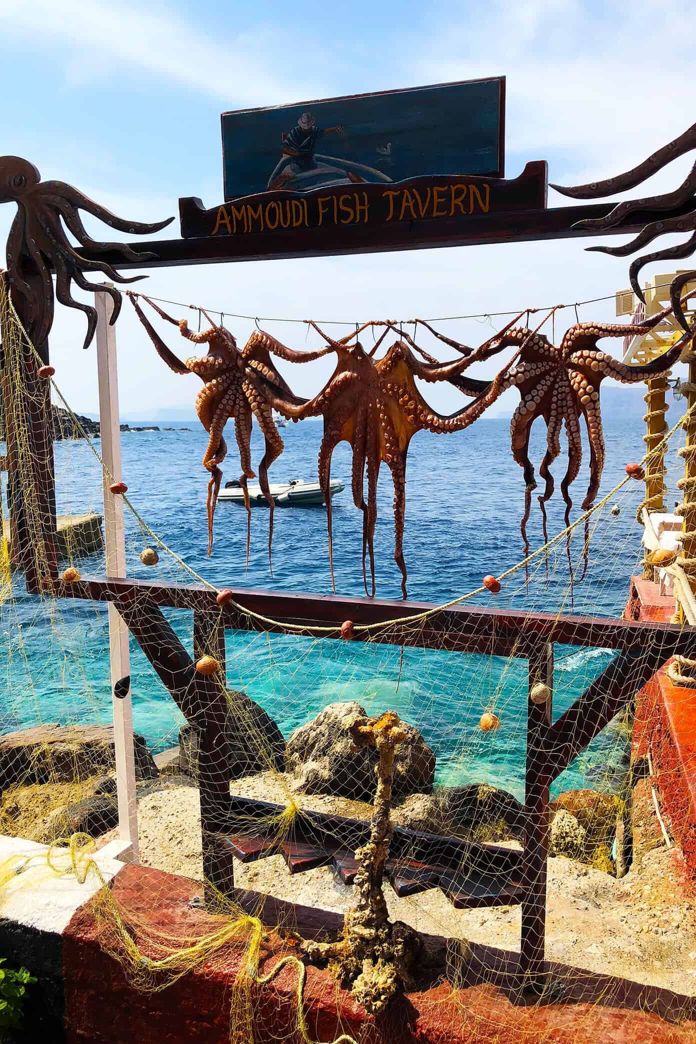 The Gimme Some Oven travel guide for restaurants to eat, hotels to stay and places to visit in Santorini, Greece. | Gimme Some Oven #santorini #greece #travel #traveltips #europe #vacation #islands #hotel #restaurant Ammoudi Fish Tavern in Santorini, Greece