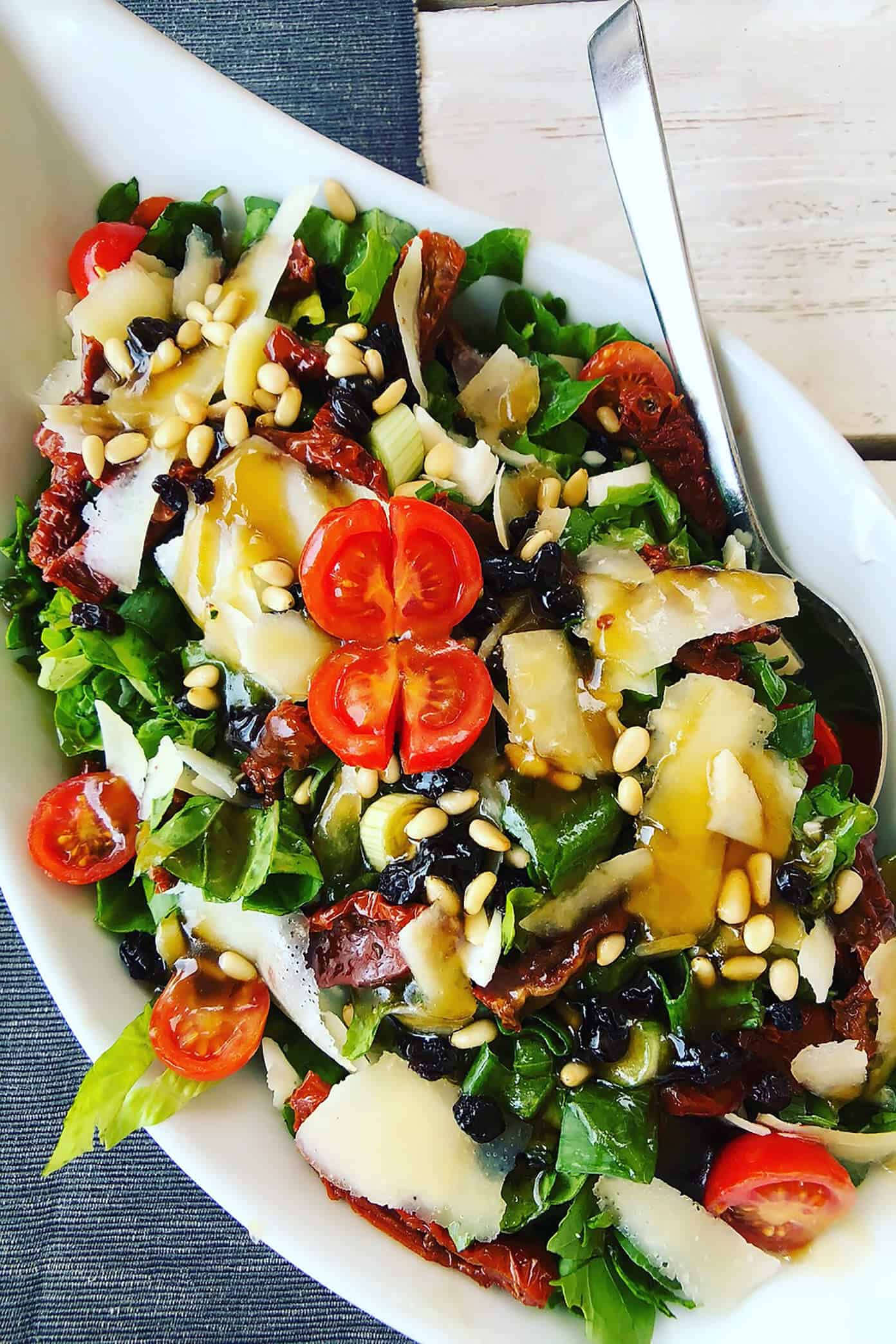 The Gimme Some Oven travel guide for restaurants to eat, hotels to stay and places to visit in Santorini, Greece. | Gimme Some Oven #santorini #greece #travel #traveltips #europe #vacation #islands #hotel #restaurant Greek Salad in Fira Santorini Greece