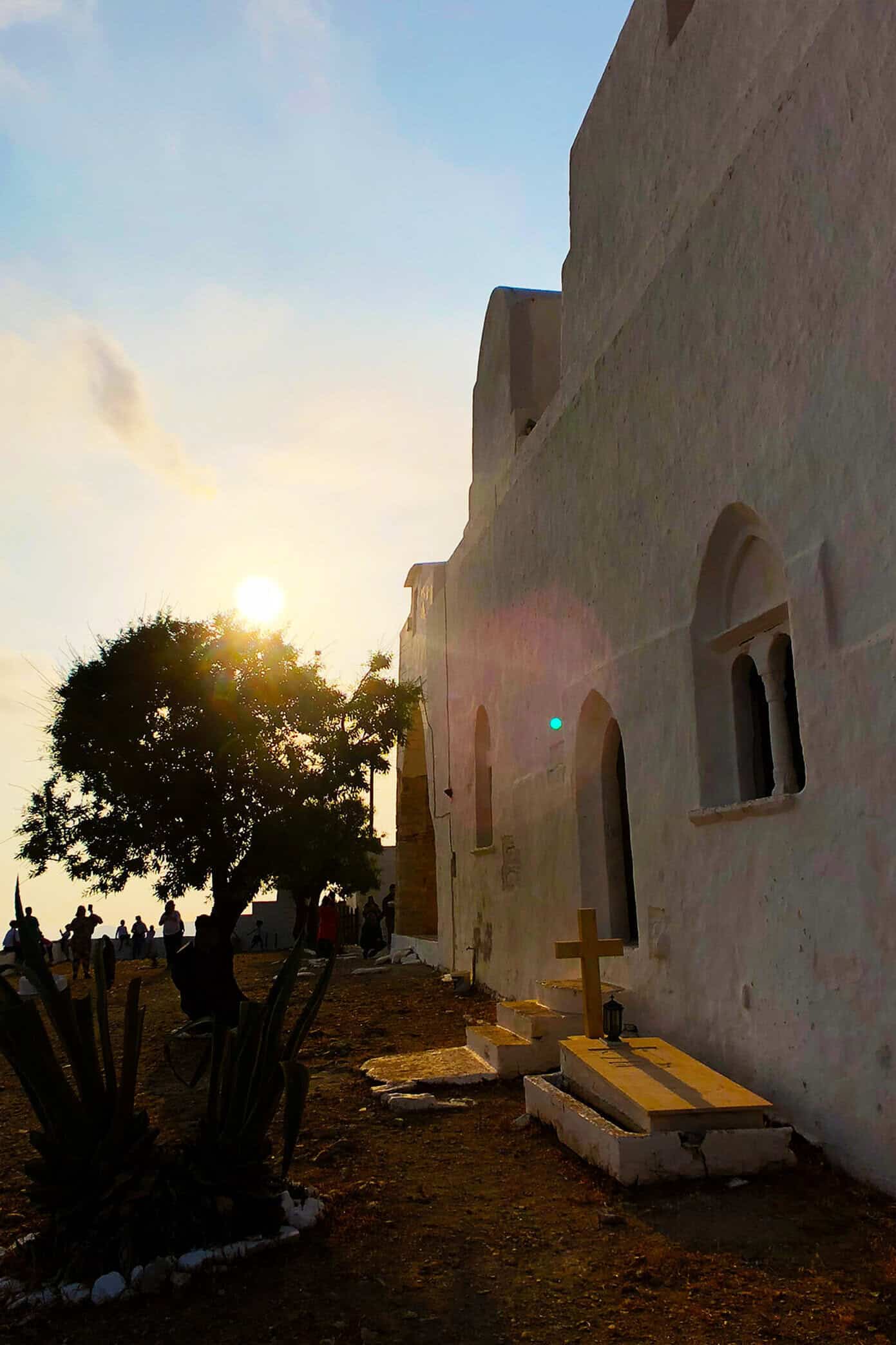 The Gimme Some Oven travel guide for restaurants to eat, hotels to stay and places to visit in Santorini, Greece. | Gimme Some Oven #santorini #greece #travel #traveltips #europe #vacation #islands #hotel #restaurant Sunset Church Views in Folegandros, Greece