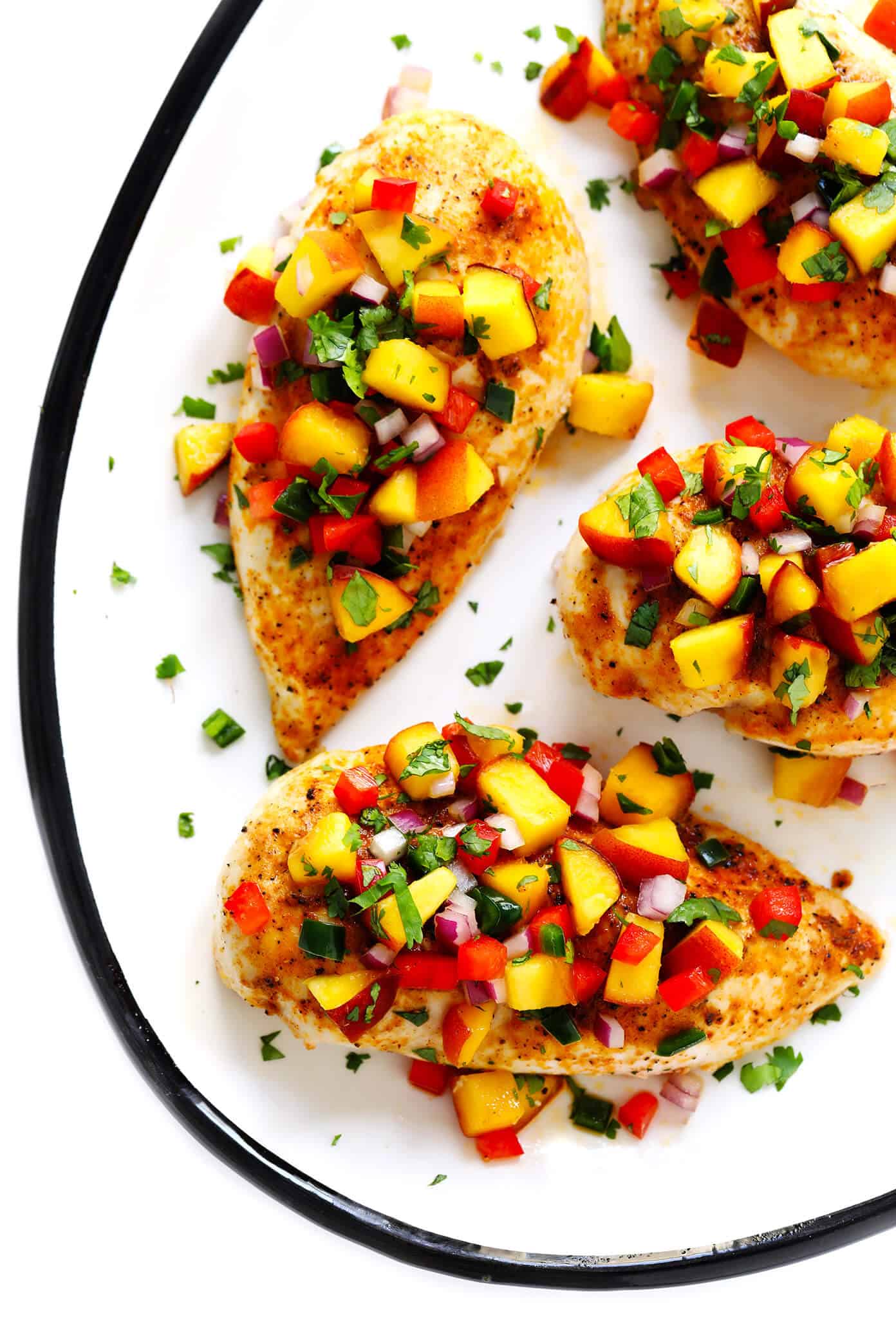 This Baked Ginger Chicken recipe is perfectly cooked and full of great flavor, then topped with a sprinkling of confetti fresh peach salsa. It's the perfect sweet and savory summer dinner recipe! | Gimme Some Oven Baked Ginger Chicken Breasts with Confetti Peach Salsa