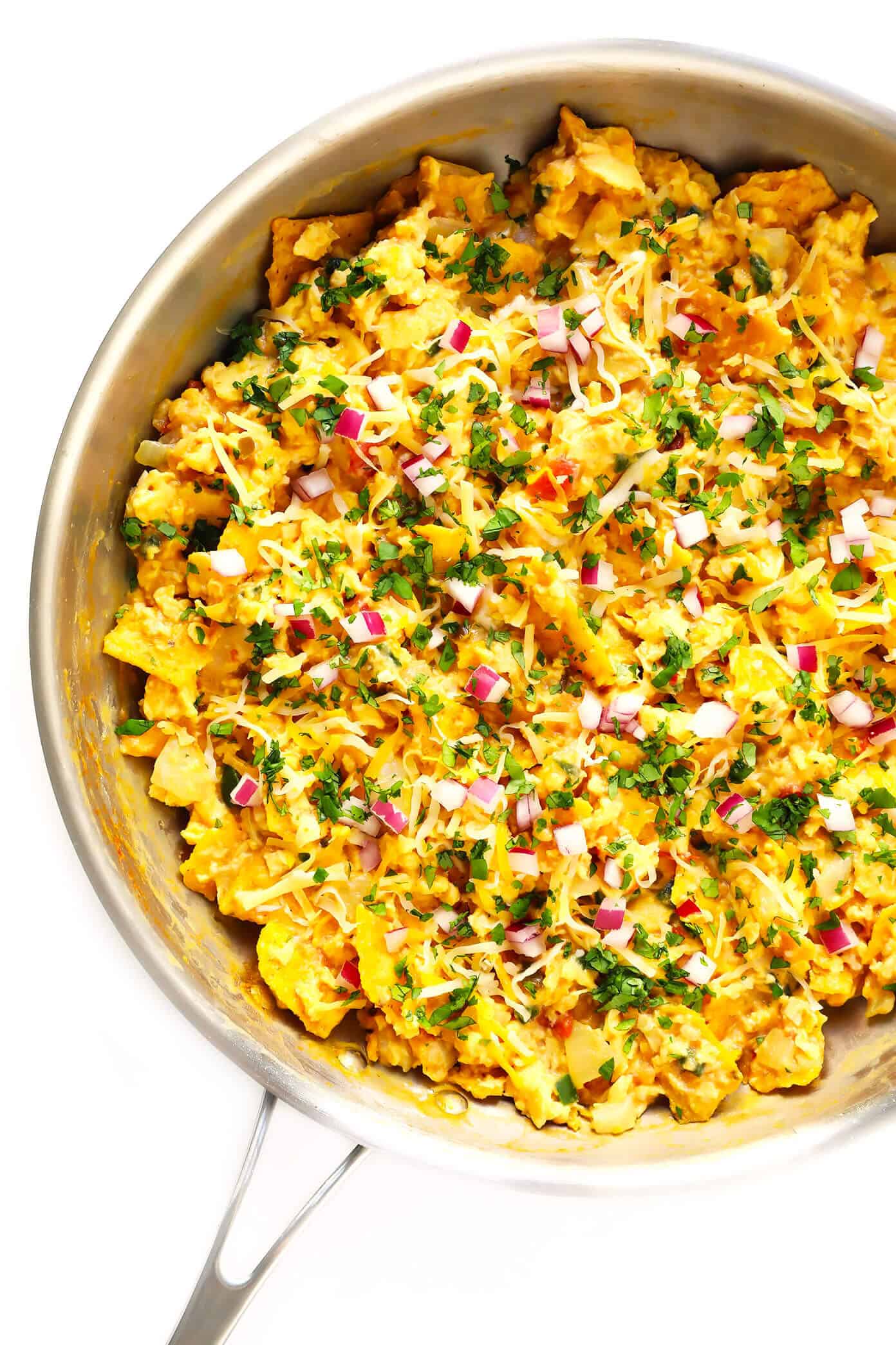 LOVE this easy migas recipe! It's a simple Tex-Mex egg scramble made with leftover tortilla chips and salsa, and sprinkled with avocado, cheese and any other favorite toppings. Wrap in tortillas to make tacos, or just serve plain for breakfast, brunch, lunch or dinner! | gimmesomeoven.com #migas #texmex #breakfast #brunch #egg #scramble #mexican #vegetarian #dinner How To Make Migas