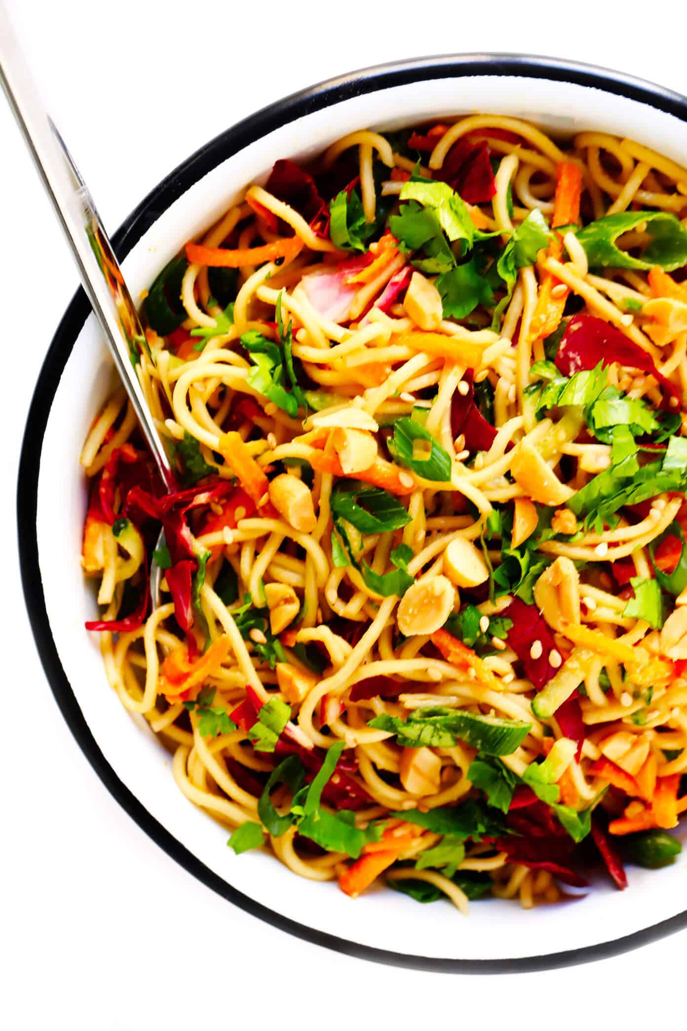 This Cold Sesame Peanut Noodles recipe is downright irresistible! It's made with the BEST peanut sauce recipe, it's easy to customize with your favorite noodles, veggies and proteins (chicken, beef, pork, shrimp or tofu would be great additions), and it's perfect for meal prep or served as an easy dinner recipe. | Gimme Some Oven #mealprep #dinner #noodles #peanutsauce #recipe Cold Sesame Peanut Noodles Recipe In Bowl