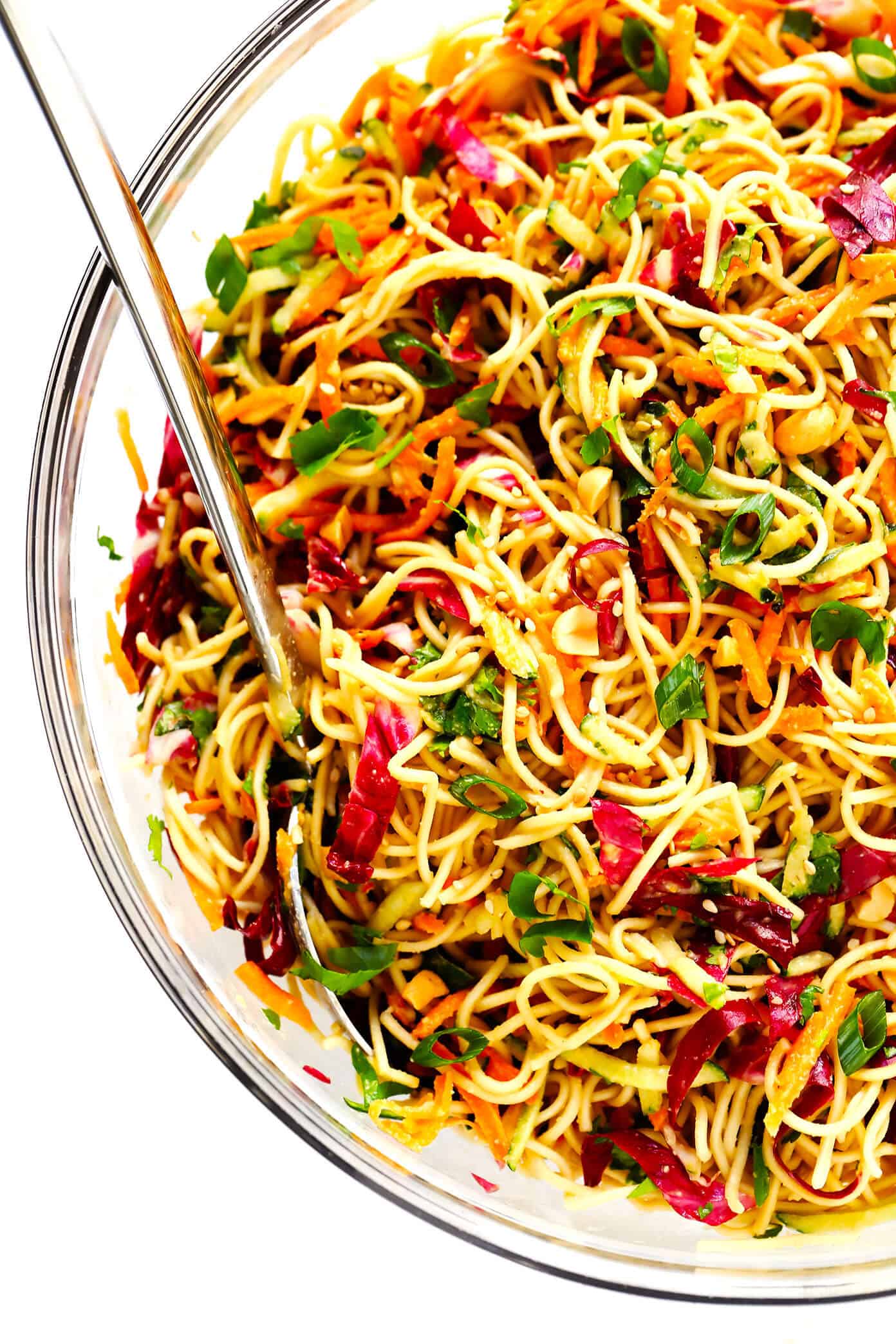 This Cold Sesame Peanut Noodles recipe is downright irresistible! It's made with the BEST peanut sauce recipe, it's easy to customize with your favorite noodles, veggies and proteins (chicken, beef, pork, shrimp or tofu would be great additions), and it's perfect for meal prep or served as an easy dinner recipe. | Gimme Some Oven Cold Peanut Sesame Noodles Recipe