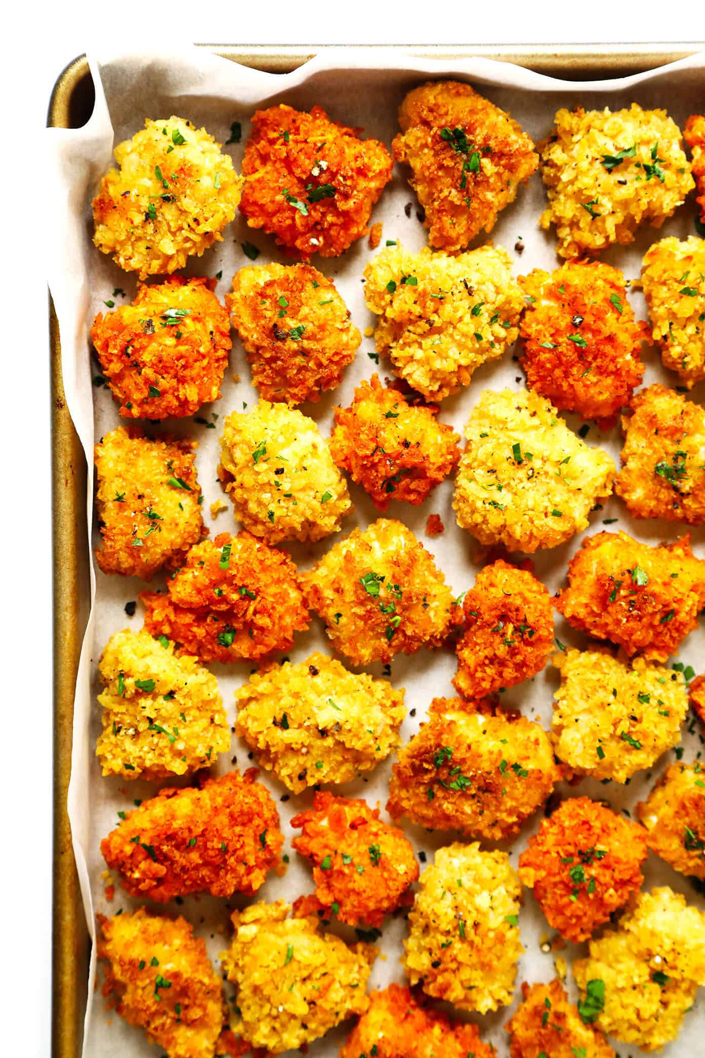 These Ultra-Crispy Baked Chicken nuggets are the best! They're made with 3 ingredients, naturally gluten-free, and easy to customize with your favorite flavors. The perfect easy dinner recipe! | Gimme Some Oven #dinner #chicken #nuggets #kids #glutenfree #kettlechips 3-Ingredient Baked Chicken Nuggets Recipe made with your favorite kind of Kettle Chips