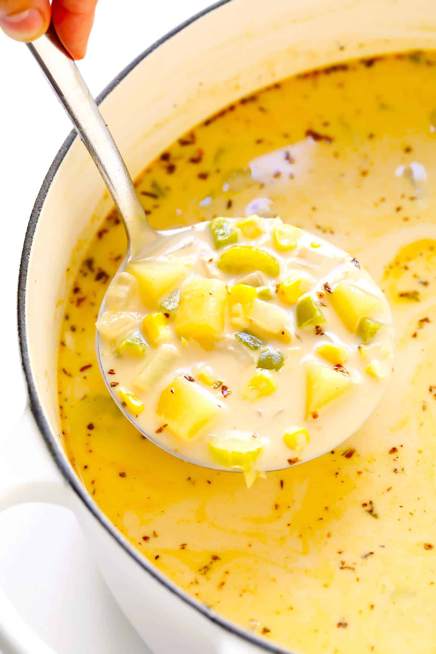 LOVE this zesty Cajun Corn Chowder recipe! It's lightened up with healthier ingredients, including lots of protein-packed lentils and creamy coconut milk, and it's the perfect dinner recipe for summer and fall. | Gimme Some Oven #corn #chowder #soup #vegan #glutenfree #vegetarian #healthy #dinner #cajun #recipe Vegan Cajun Corn Chowder Recipe