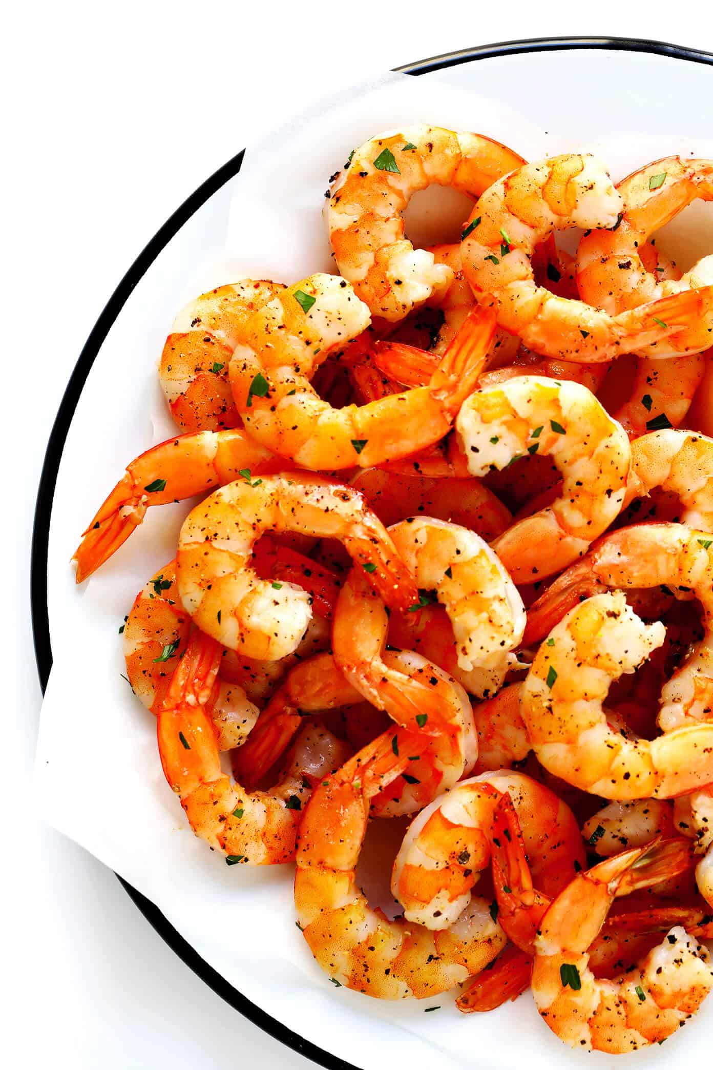 This 10-Minute Baked Shrimp recipe is brilliant! It's super easy to cook in the oven, totally customizable with your favorite seasonings, and absolutely delicious. | Gimme Some Oven #shrimp #oven #healthy #dinner #recipe #easy #glutenfree Oven Roasted Shrimp Recipe | The easiest method for how to cook shrimp!