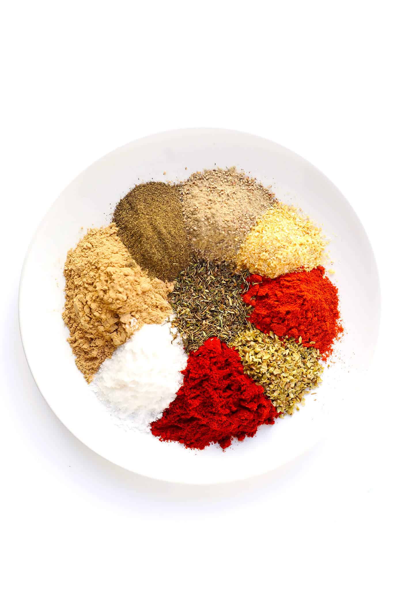 The best homemade Cajun Seasoning recipe! It only takes about 5 minutes to make, and tastes great on everything from chicken to shrimp, veggies to tofu, every kind of potato and more. Use it in a soup, stir-fry, pasta, kabob, dip, crackers, sheet pan dinner - you name it! It's the bold, zesty, spicy blend that kicks any dish up a delicious notch. | Gimme Some Oven #cajun #seasoning #spice #blend #spicy #glutenfree #homemade How To Make Cajun Seasoning