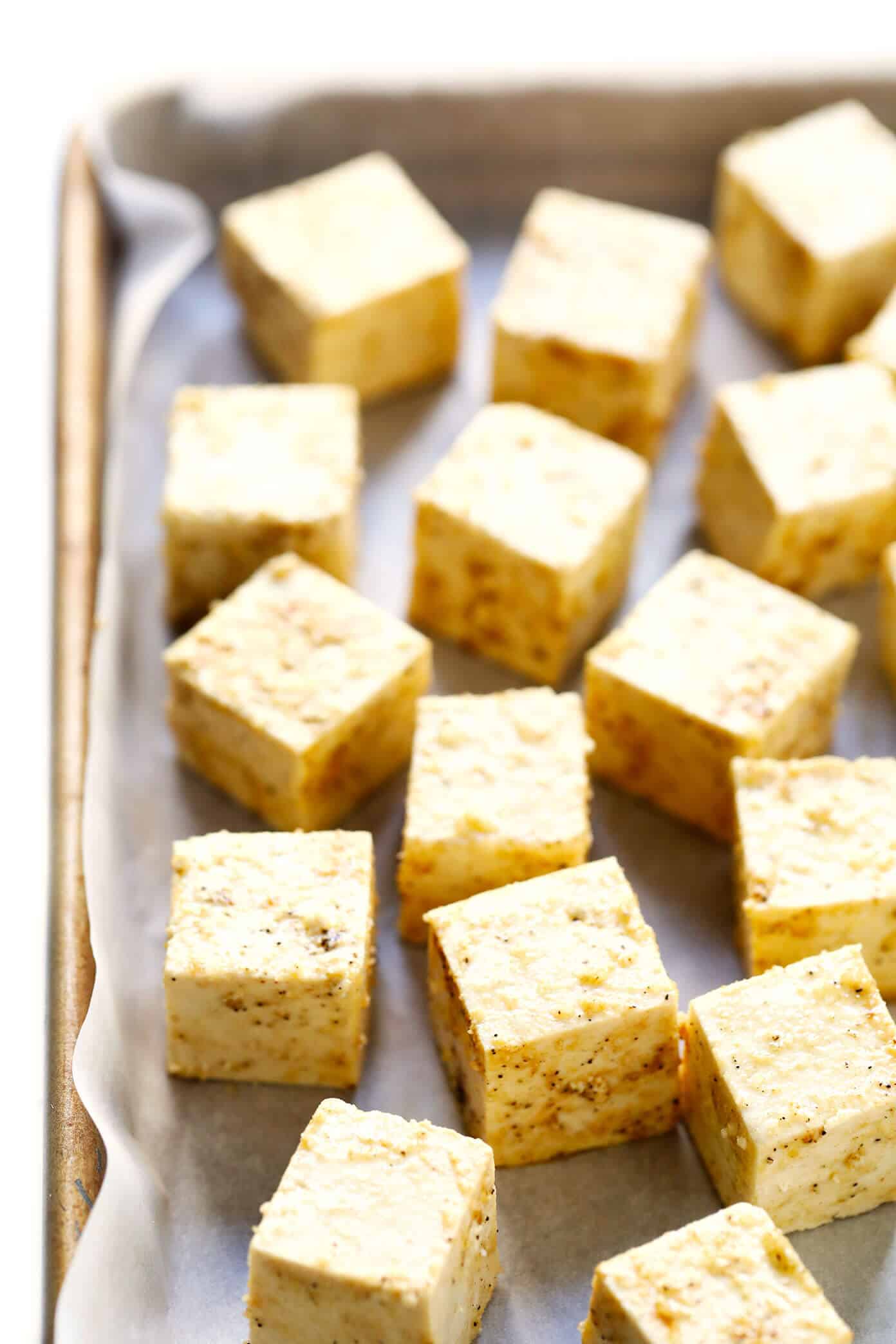 This 30-Minute Crispy Baked Tofu recipe is the BEST! It's quick and easy to make, totally customizable with your favorite seasonings or sauces, naturally gluten-free and vegan, and perfect for adding to a soup, stir-fry, curry, or whatever sounds good. | Gimme Some Oven #tofu #healthy #vegetarian #vegan #glutenfree #dinner #recipe How To Bake Tofu In The Oven | Crispy Baked Tofu Recipe