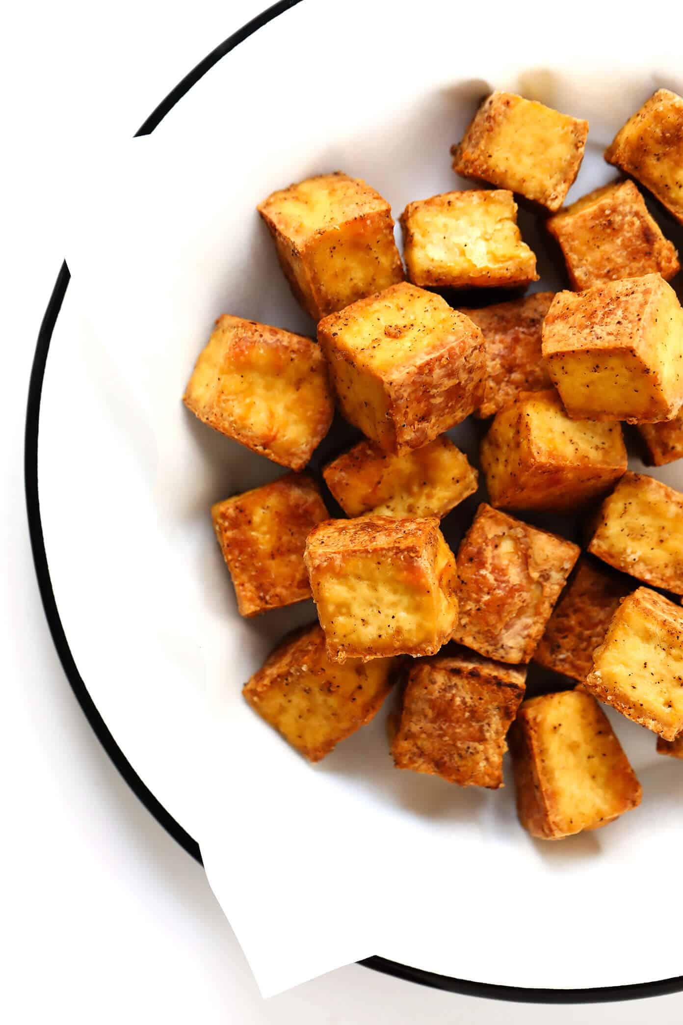 This 30-Minute Crispy Baked Tofu recipe is the BEST! It's quick and easy to make, totally customizable with your favorite seasonings or sauces, naturally gluten-free and vegan, and perfect for adding to a soup, stir-fry, curry, or whatever sounds good. | Gimme Some Oven #tofu #healthy #vegetarian #vegan #glutenfree #dinner #recipe Easy Crispy Baked Tofu Recipe | Gimme Some Oven
