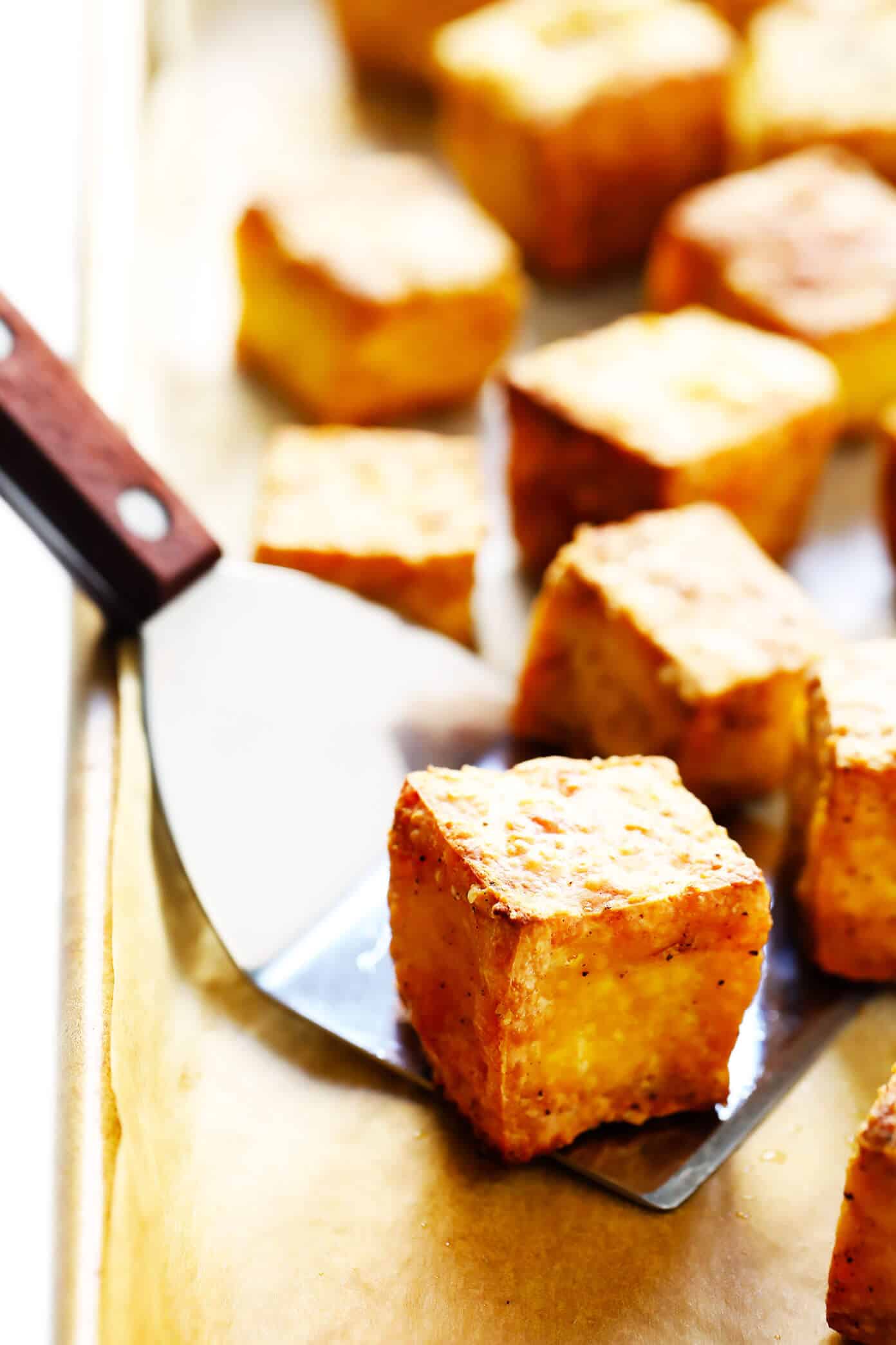This 30-Minute Crispy Baked Tofu recipe is the BEST! It's quick and easy to make, totally customizable with your favorite seasonings or sauces, naturally gluten-free and vegan, and perfect for adding to a soup, stir-fry, curry, or whatever sounds good. | Gimme Some Oven #tofu #healthy #vegetarian #vegan #glutenfree #dinner #recipe How To Make Perfectly Baked Tofu