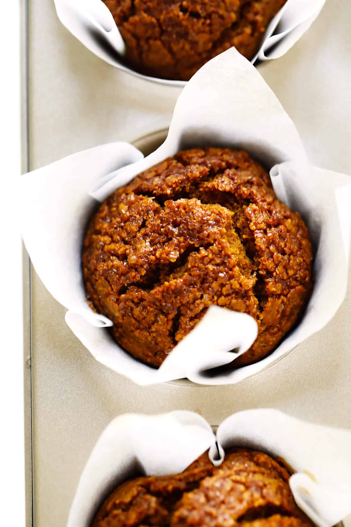 LOVE this healthy pumpkin muffins recipe! They're naturally gluten-free, naturally sweetened with maple syrup, easy to make, and SO delicious. Perfect for fall breakfast, dessert, and snacking. | Gimme Some Oven #pumpkin #muffins #breakfast #glutenfree #healthy #fall #thanksgiving #dessert Healthy Pumpkin Muffins Recipe with Maple Syrup