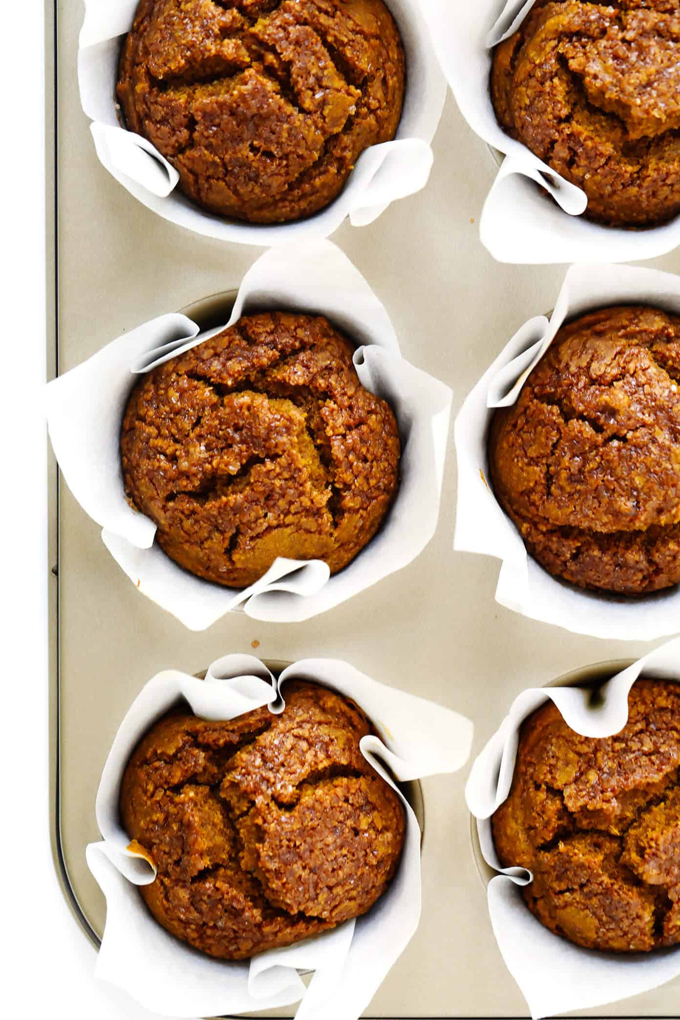 LOVE this healthy pumpkin muffins recipe! They're naturally gluten-free, naturally sweetened with maple syrup, easy to make, and SO delicious. Perfect for fall breakfast, dessert, and snacking. | Gimme Some Oven #pumpkin #muffins #breakfast #glutenfree #healthy #fall #thanksgiving #dessert The BEST Healthy Pumpkin Muffins