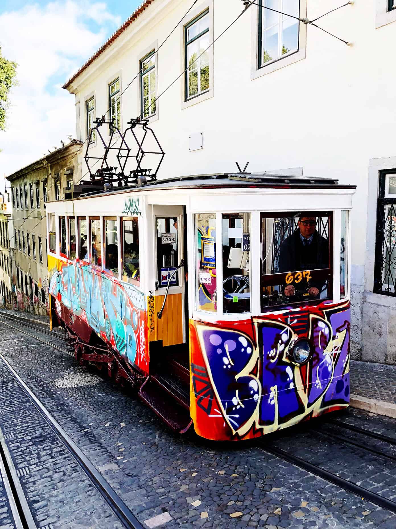 Weekend in Lisbon, Portugal -- all of our best recs on where to stay, eat and visit! | gimmesomeoven.com #travel #lisbon #portugal #traveltips Tram in Portugal
