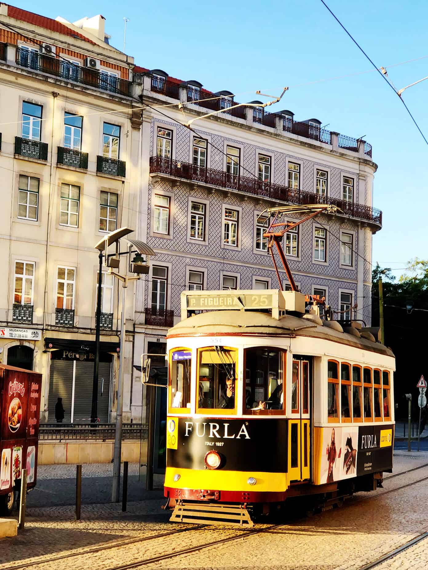 Weekend in Lisbon, Portugal -- all of our best recs on where to stay, eat and visit! | gimmesomeoven.com #travel #lisbon #portugal #traveltips Yellow tram in Lisbon
