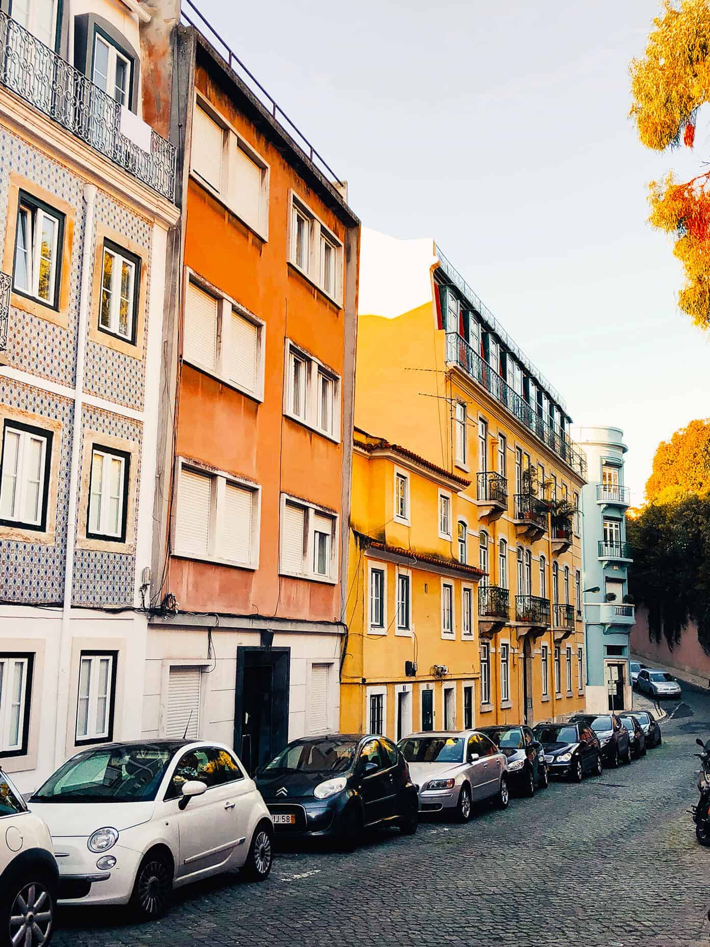 Weekend in Lisbon, Portugal -- all of our best recs on where to stay, eat and visit! | gimmesomeoven.com #travel #lisbon #portugal #traveltips Colorful houses in Lisbon