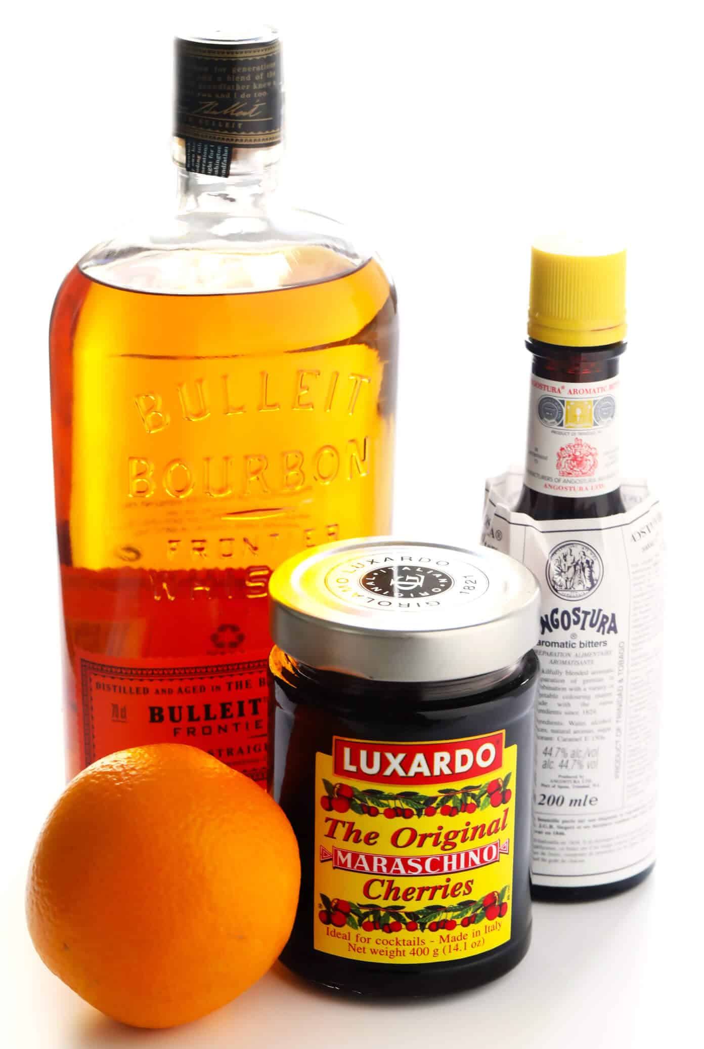 LOVE this Maple Old Fashioned Cocktail. It's made with bourbon whiskey, bitters, orange peel, and ever-so-lightly sweetened with a hint of maple syrup. Plus maybe a Luxardo cherry on top, if you'd like. The perfect, simple, classic drink. | Gimme Some Oven #cocktail #drink #oldfashioned #bourbon #whiskey Maple Old Fashioned Cocktail Drink Ingredients