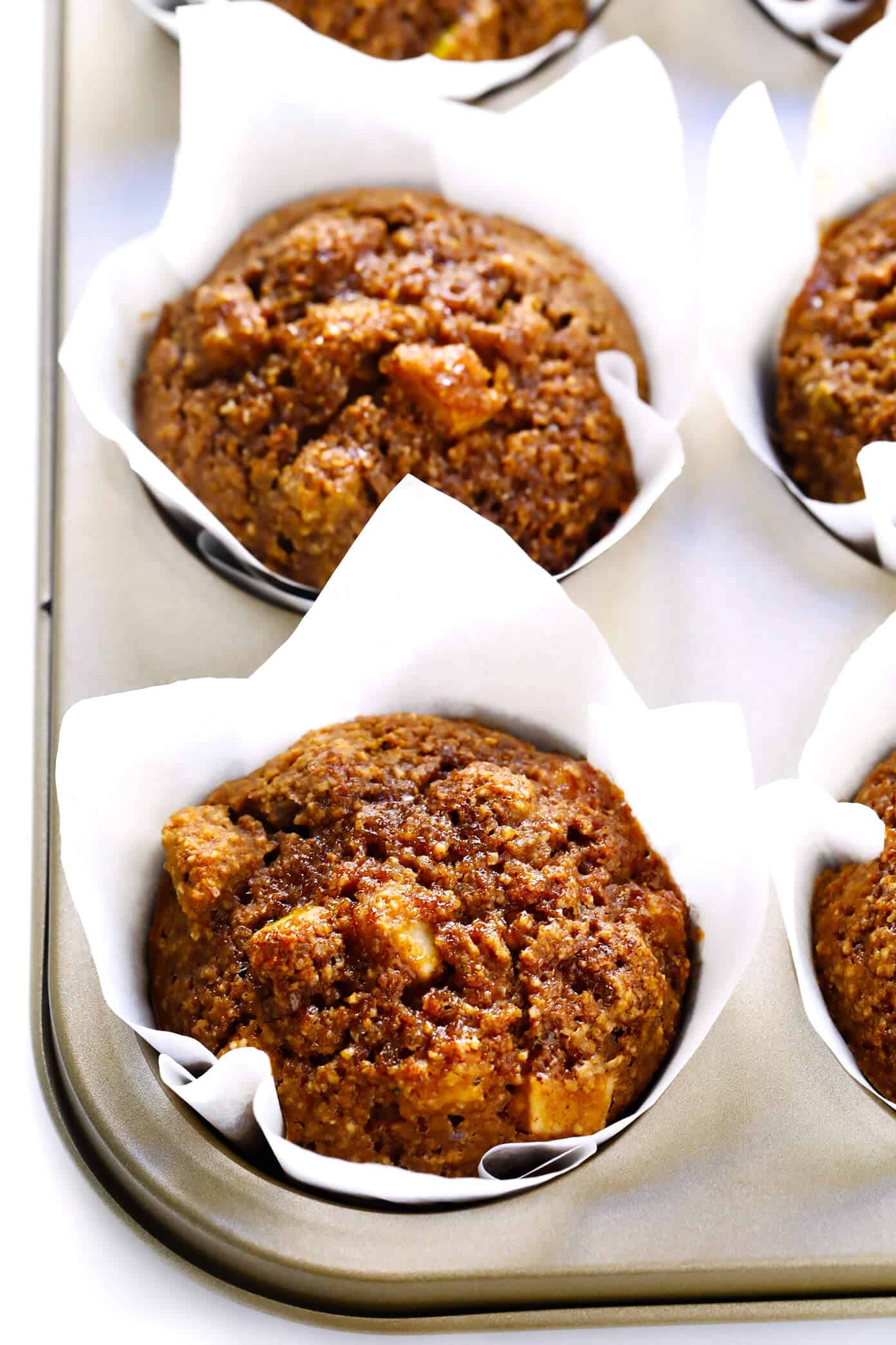 LOVE these healthy apple muffins! They're gluten-free (made with oats), lightly sweetened with maple syrup, and loaded up with lots of applesauce and fresh apples. A healthy breakfast or snack that you can feel great about! | Gimme Some Oven #healthy #muffins #breakfast #snack #brunch #apple #glutenfree #vegetarian #dairyfree Healthy Apple Muffins Recipe | Gimme Some Oven